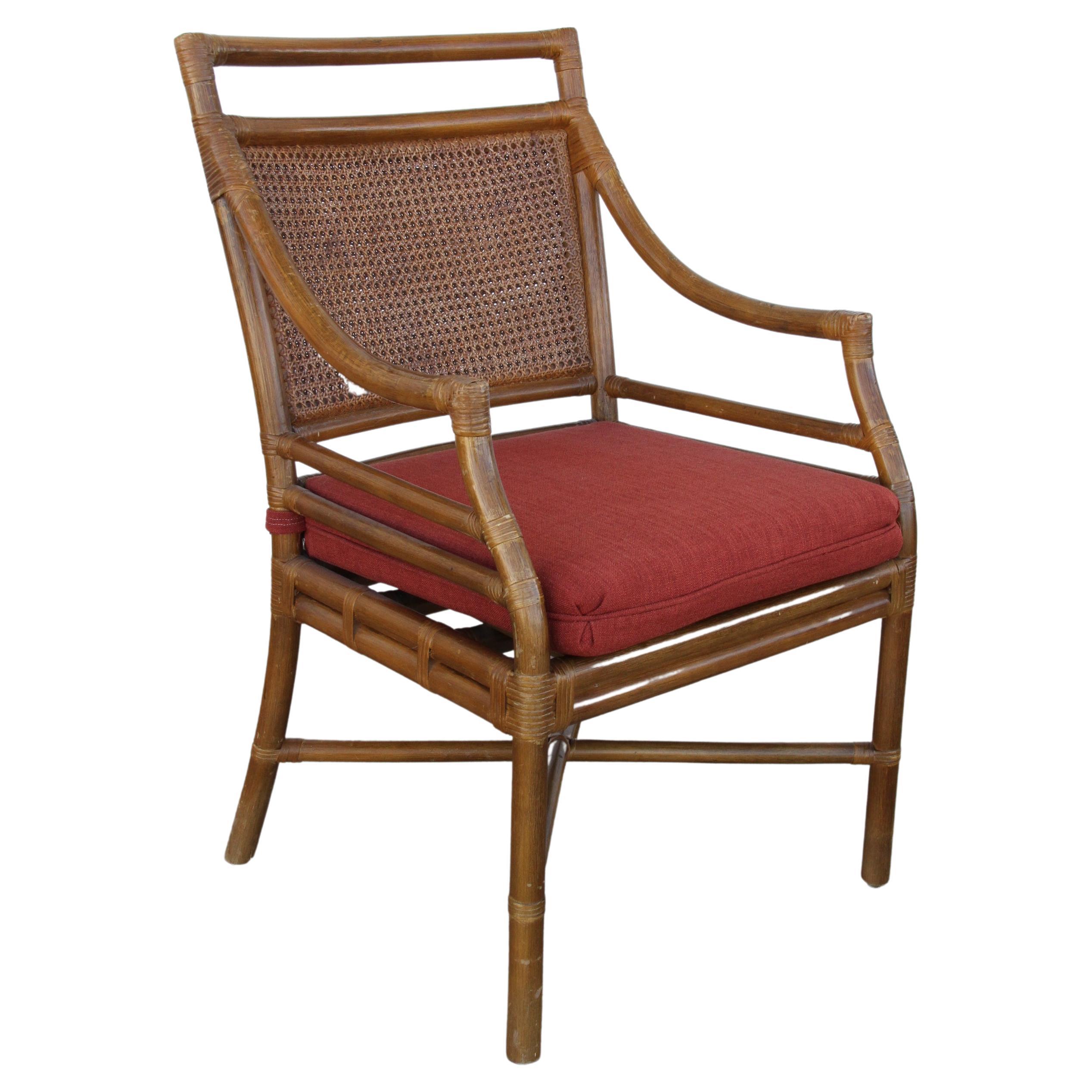 McGuire style midcentury cane bamboo dining chairs

Set of stunning bamboo and handwoven cane dining chairs.
The upholstery is in a wine fabric.

Measures: 22”x24”x36” Seat height 19”.

