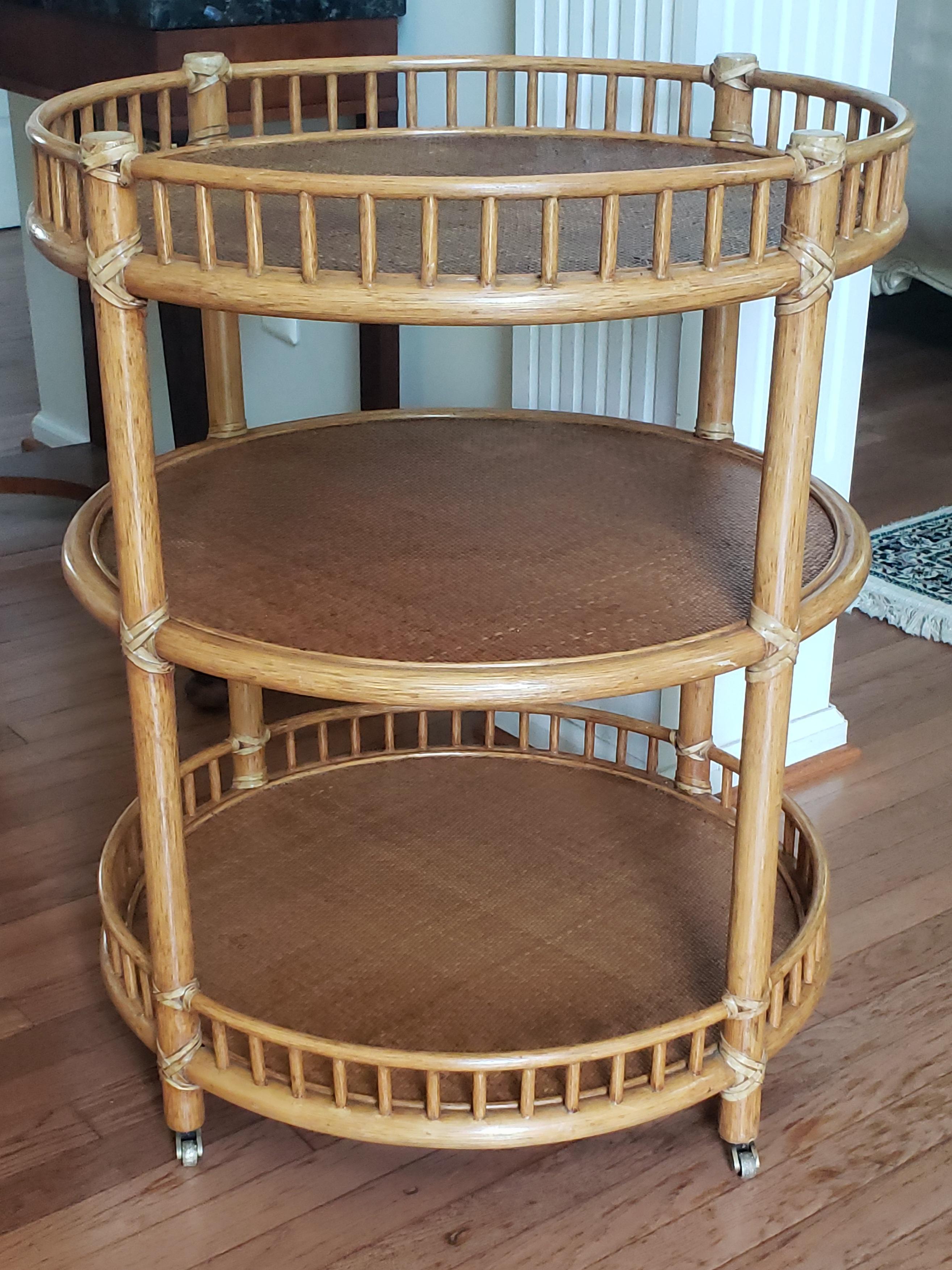 McGuire Three Tier Natural Rattan Bamboo and Leather Rolling Bar Cart In Good Condition For Sale In Germantown, MD
