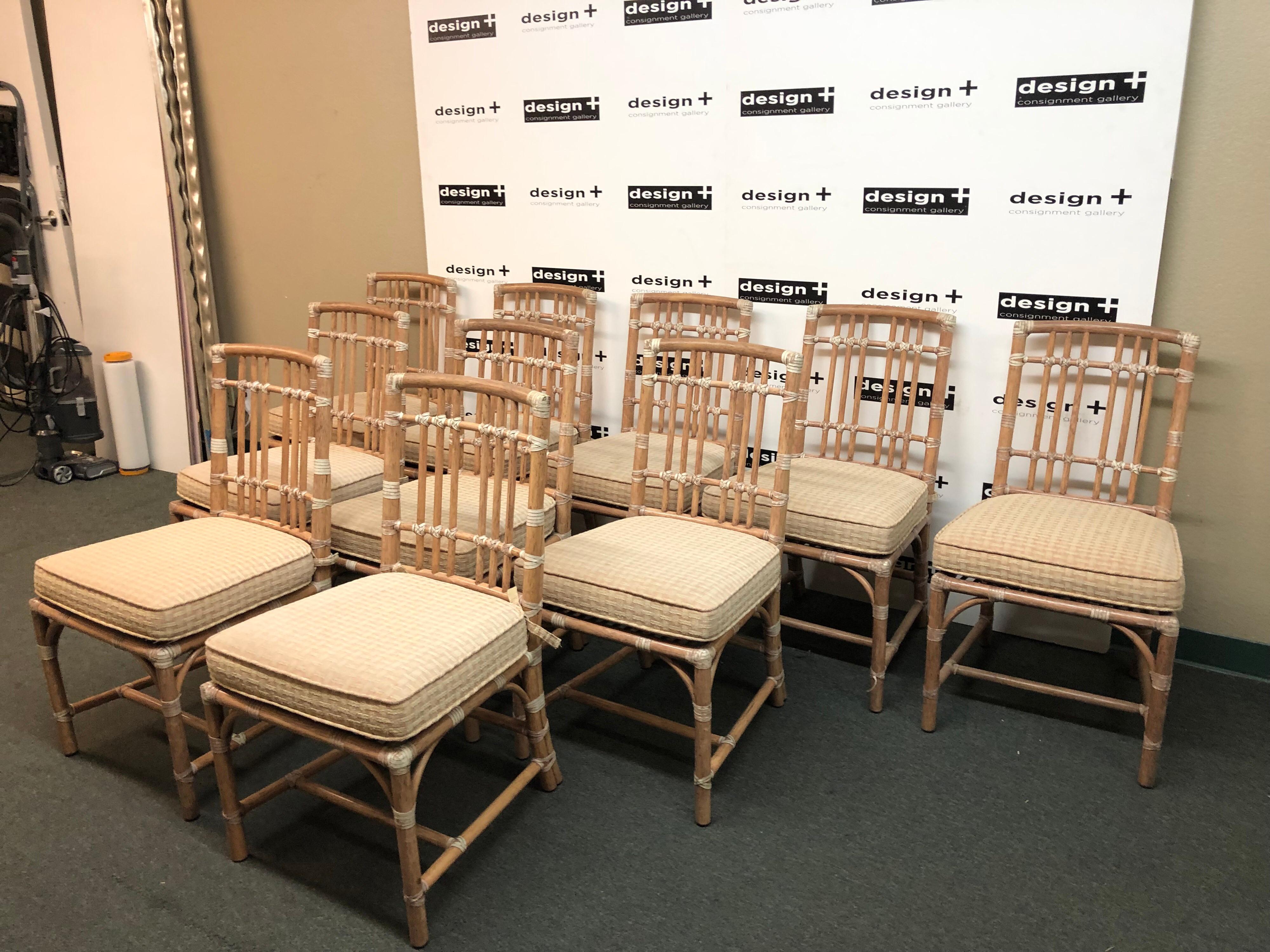 A beautiful large set of McGuire vintage dining chairs. A more casual silhouette, the ten chairs have a natural finish and classic leather wrapped joinery. Fabric cushion covers are removable for cleaning or replacement.
 