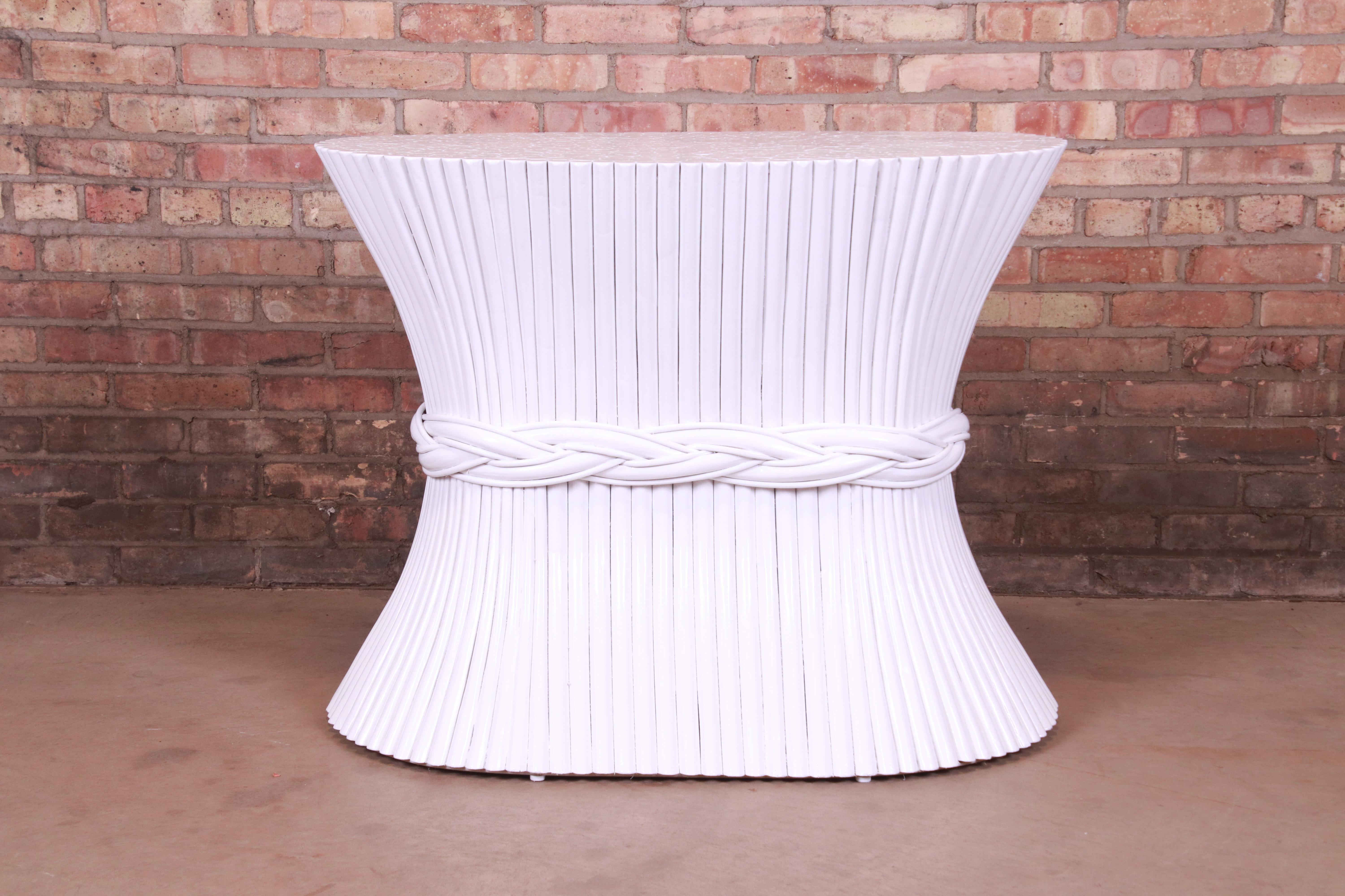 A gorgeous Mid-Century Modern Hollywood Regency dining table pedestal base

By McGuire,

USA, Circa 1960s

White lacquered bamboo in sheaf of wheat form, with ribbon weave design.

Measures: 36.5