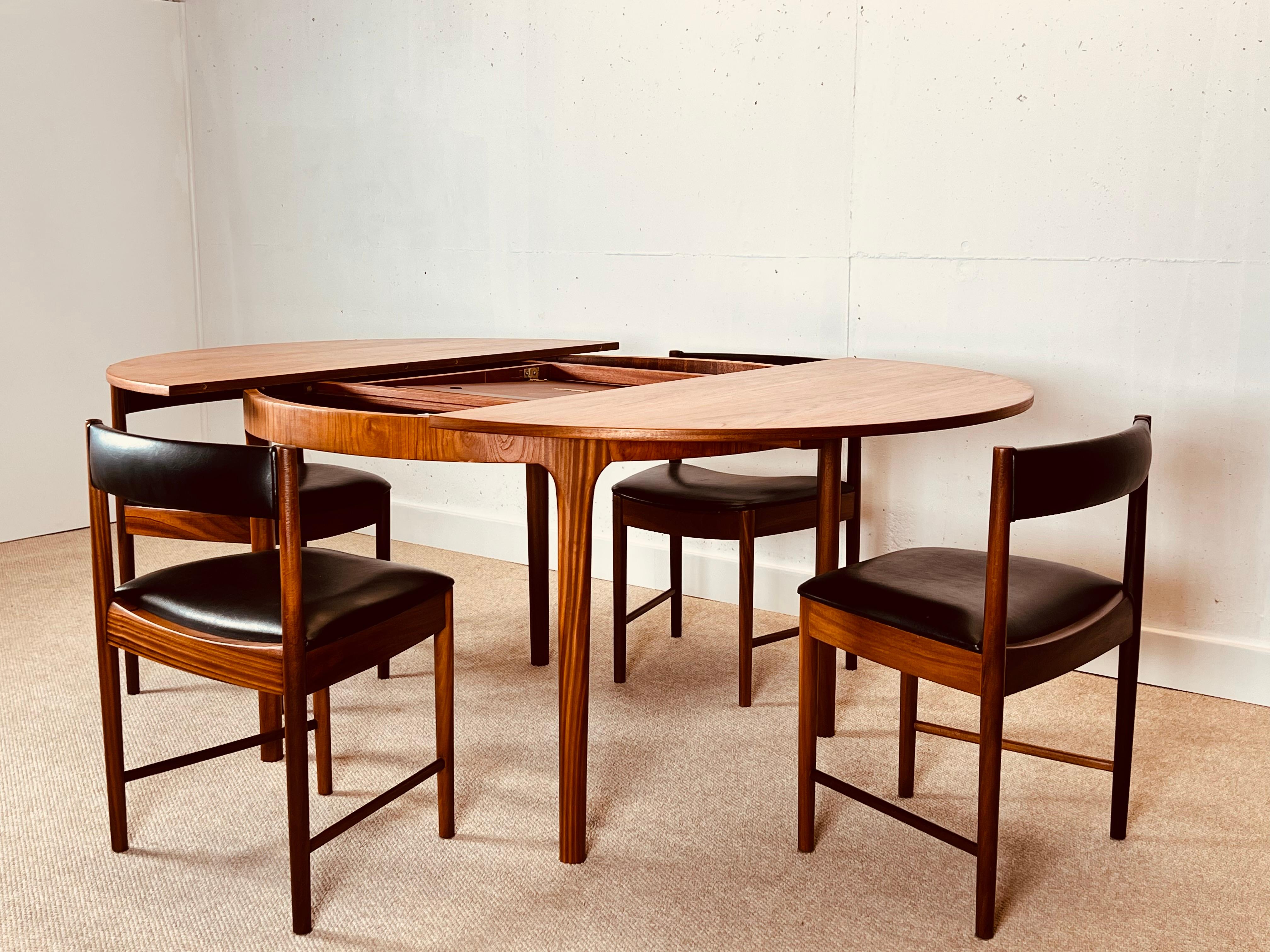 Mid-20th Century McIntosh Round Extending Teak Dining Table and Chairs in Black Vinyl