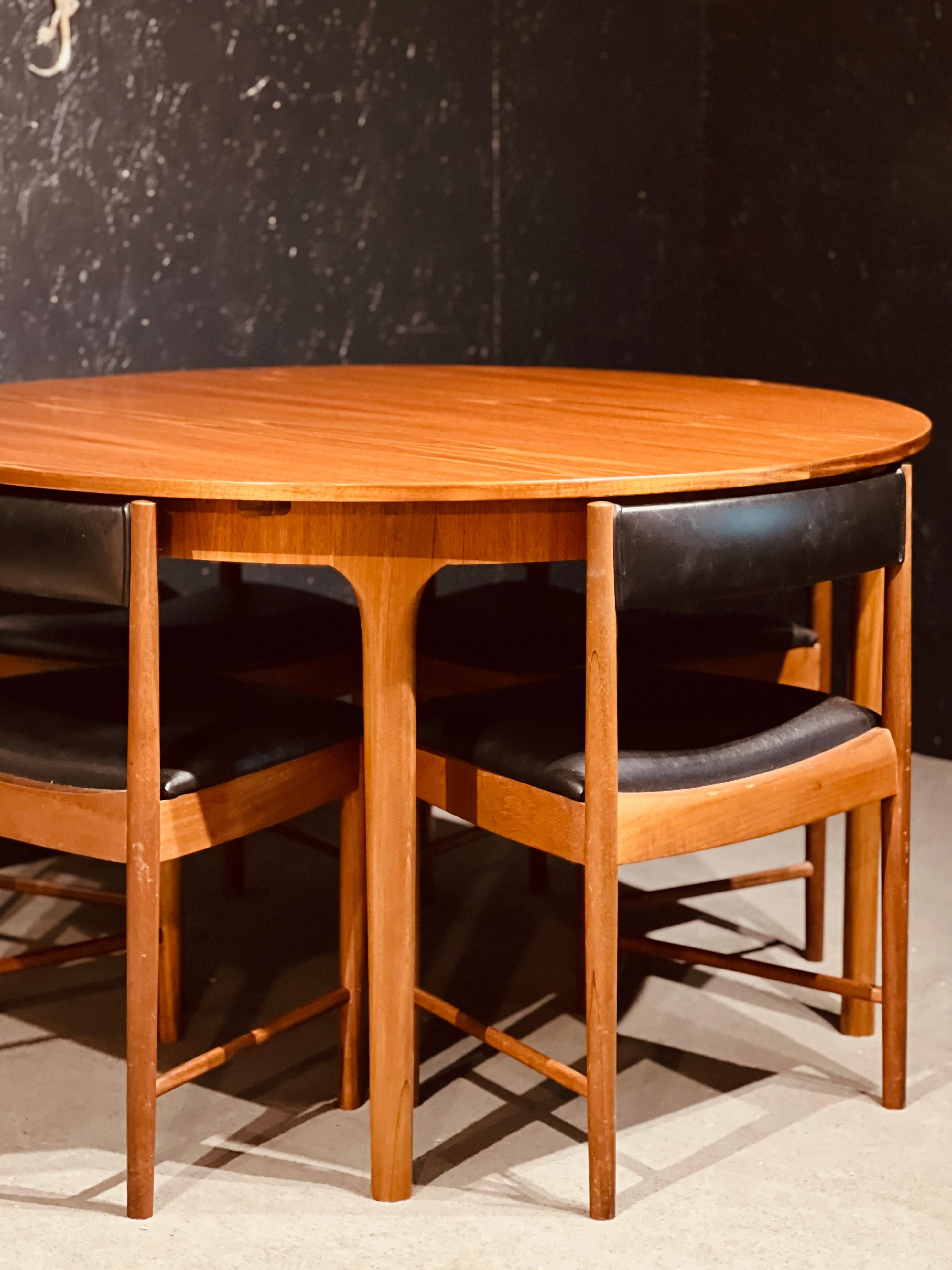 Mid-20th Century McIntosh Round Extending Teak Dining Table and Chairs in Black Vinyl