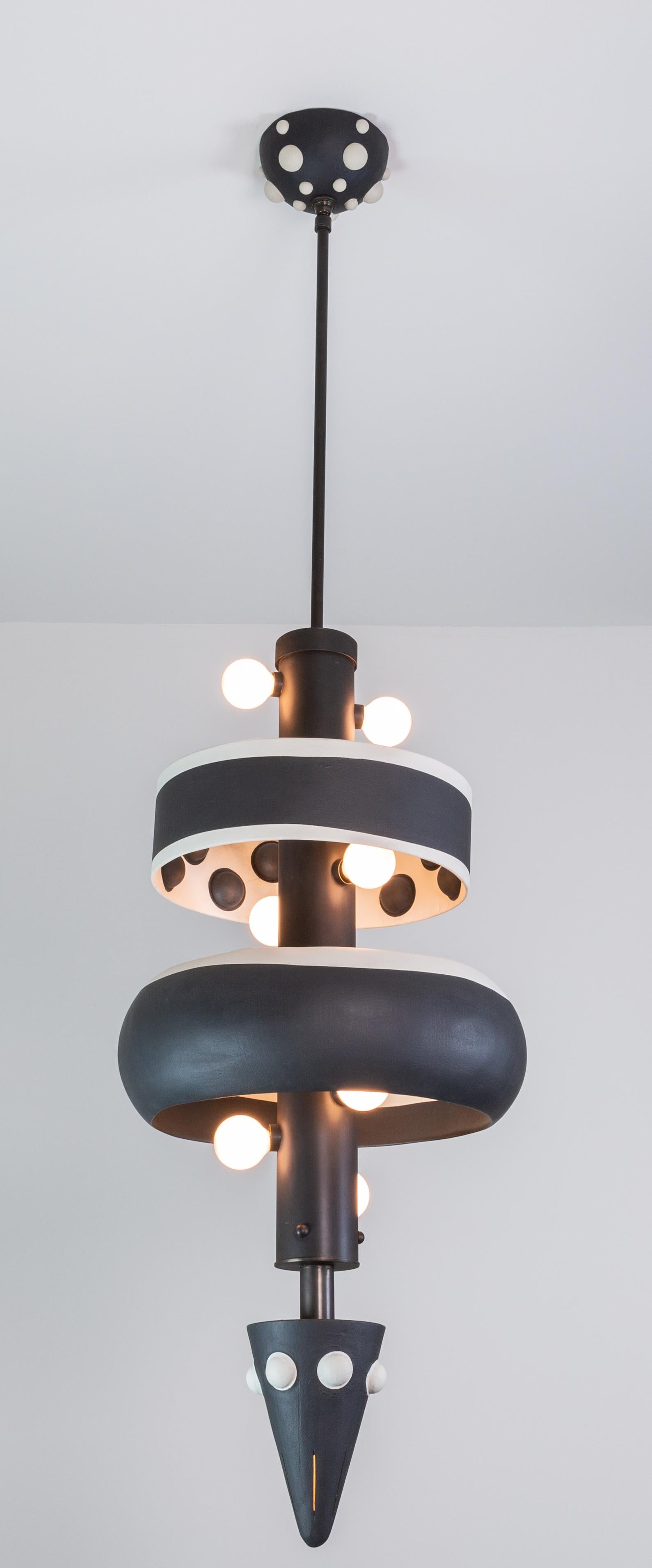 McKenzie is a pendant light, part of the Posse collection; a system designed around the core ideas of collaboration and play.

The pendant is created to give the customer freedom in tailoring their own expression. The design is centered around a