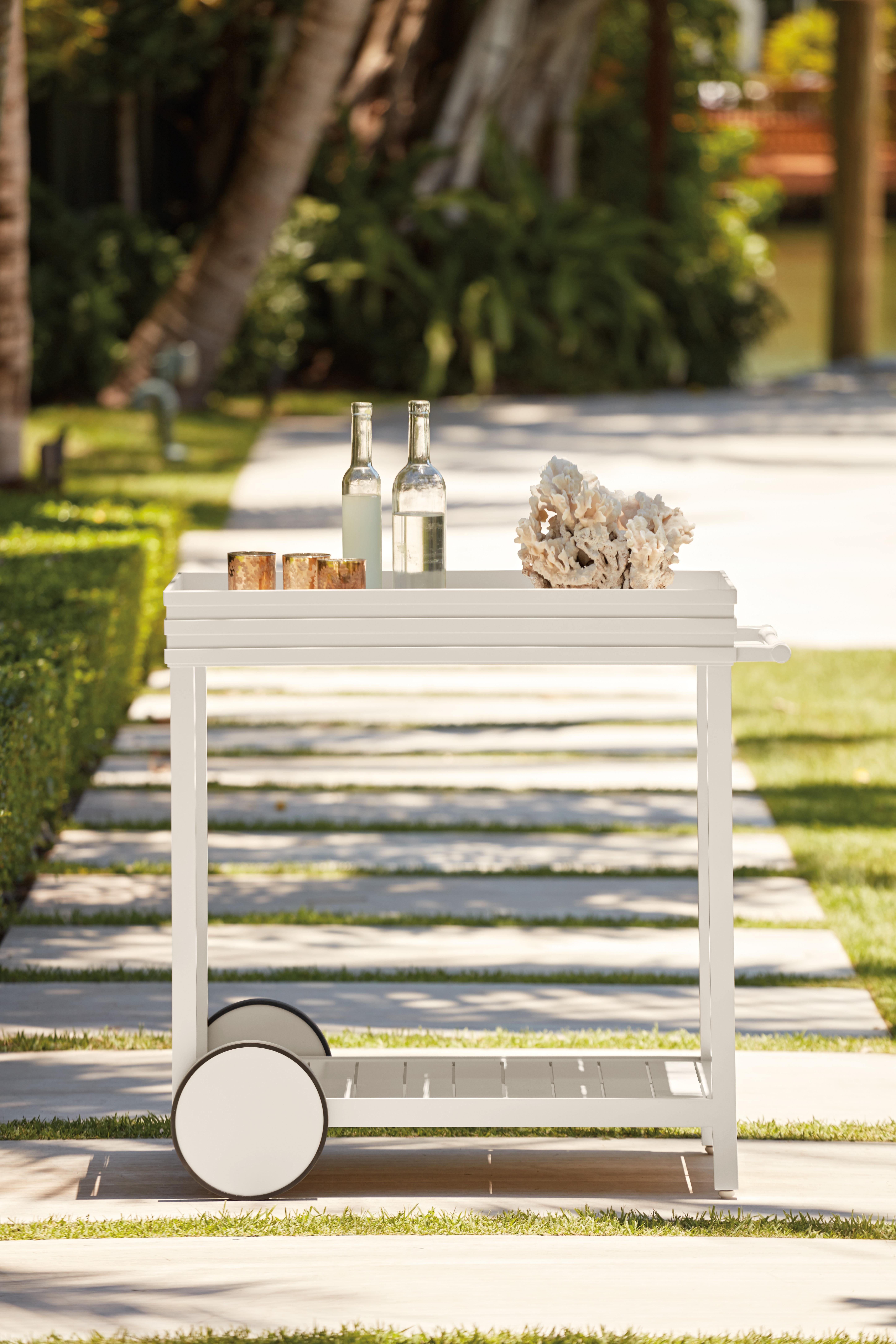 McKinnon and Harris Perrow Drinks Cart in York River Oyster finish. High performance outdoor aluminum furniture for estate, garden, and yacht. Our chic drinks trolley is highlighted by sleek Perrow raised banding, a signature detail crafted from