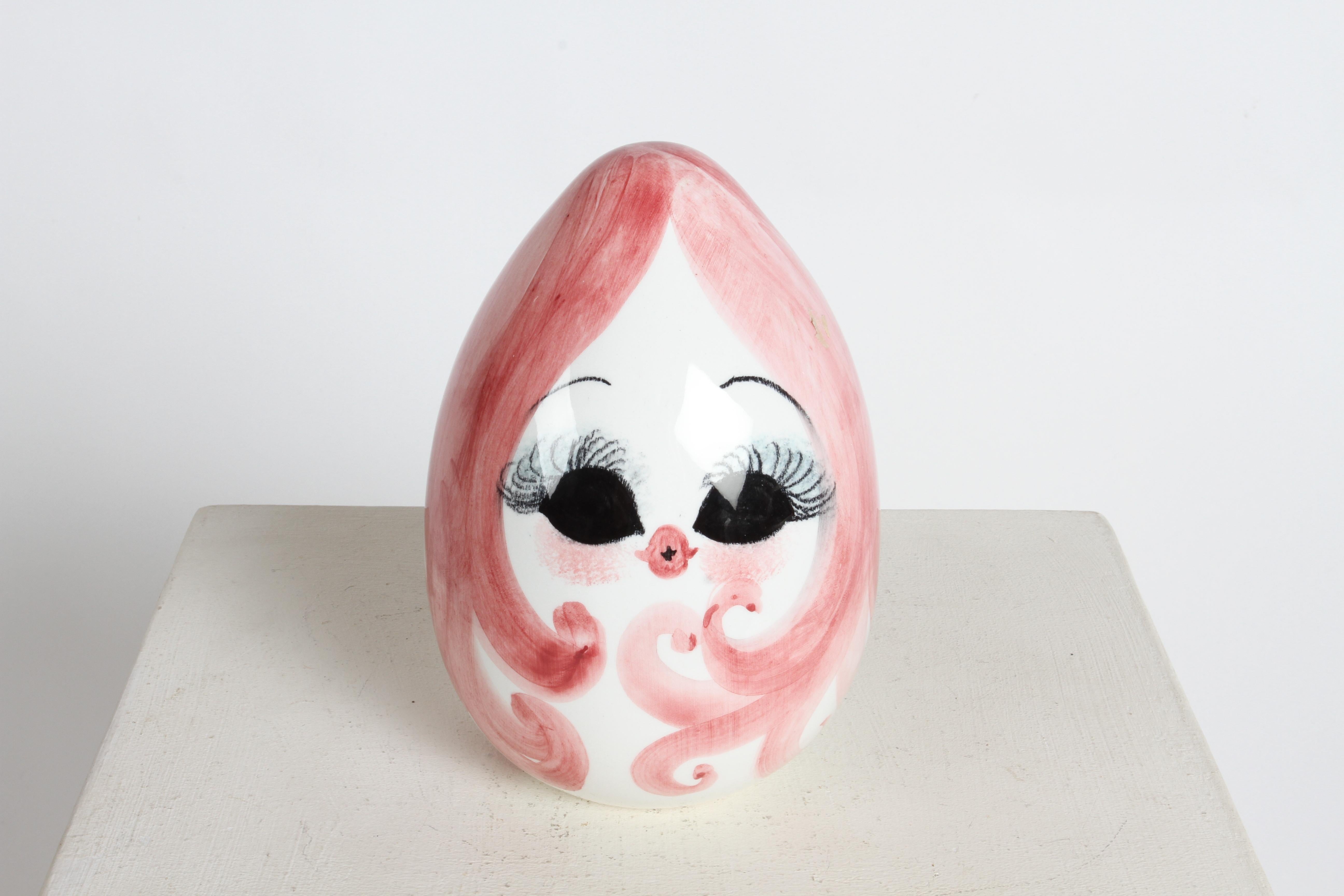 Whimsy MCM 1960s Italian hand painted female head in egg form piggy bank. Hand painted in Italy. In fine condition, no issues 

In the style of  Coop Cer Art Quadrifoglio 

