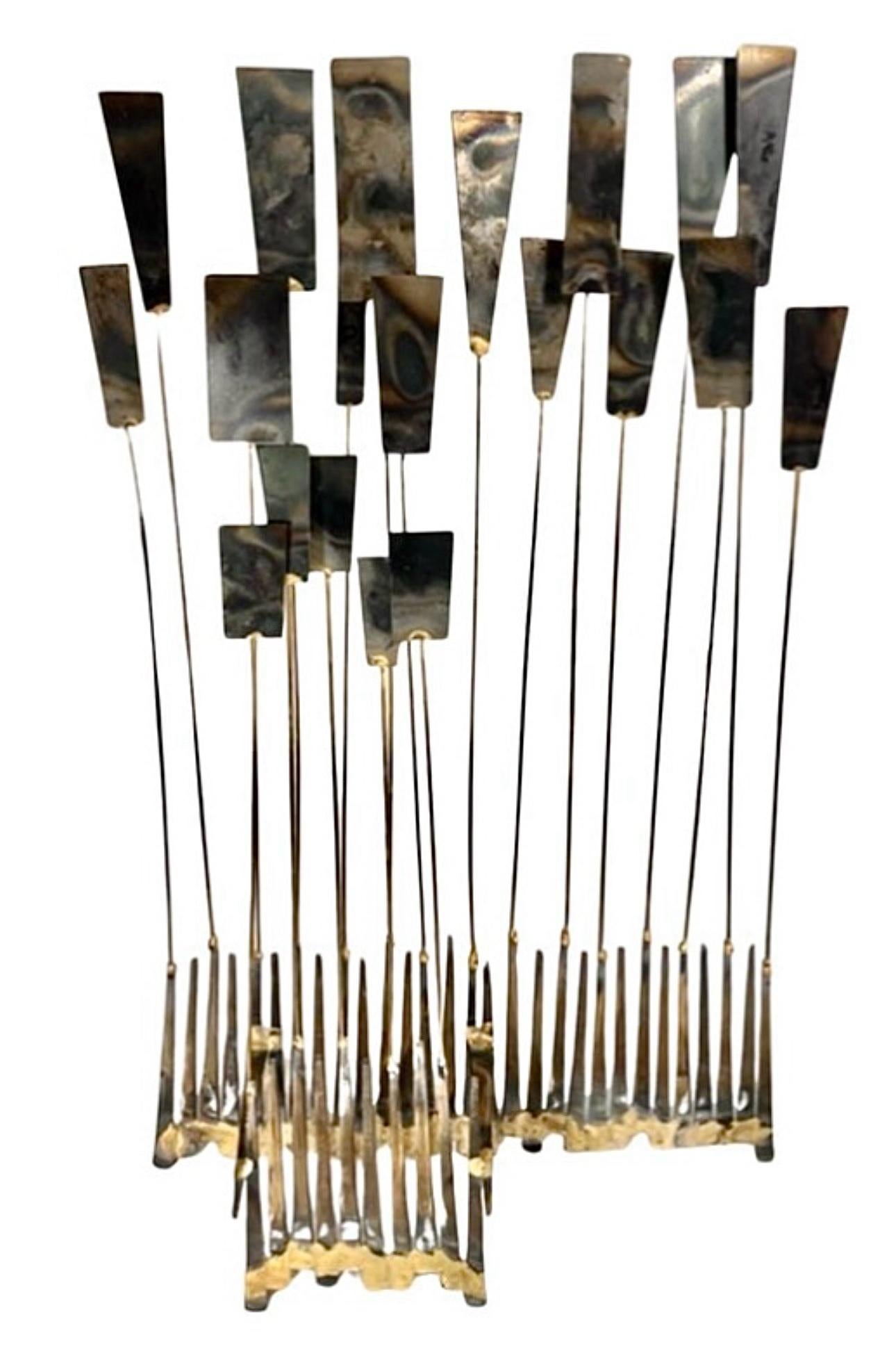 A fantastic, William Bowie inspired, Mid Century Modern, Brutalist, Metal, Kinetic table sculpture
(Unsigned. Aiidentified it as a William Bowie sculpture) 

The base features 2 rows of steel masonry nails, welded together with a gold/brass hued