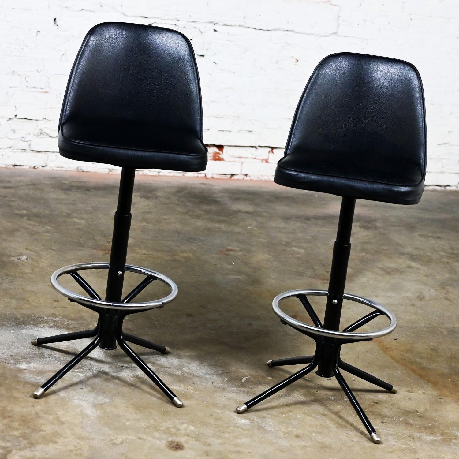 Mid-Century Modern MCM Adjustable Swivel Barstools Black Vinyl Chrome & Black Painted Steel a Pair For Sale