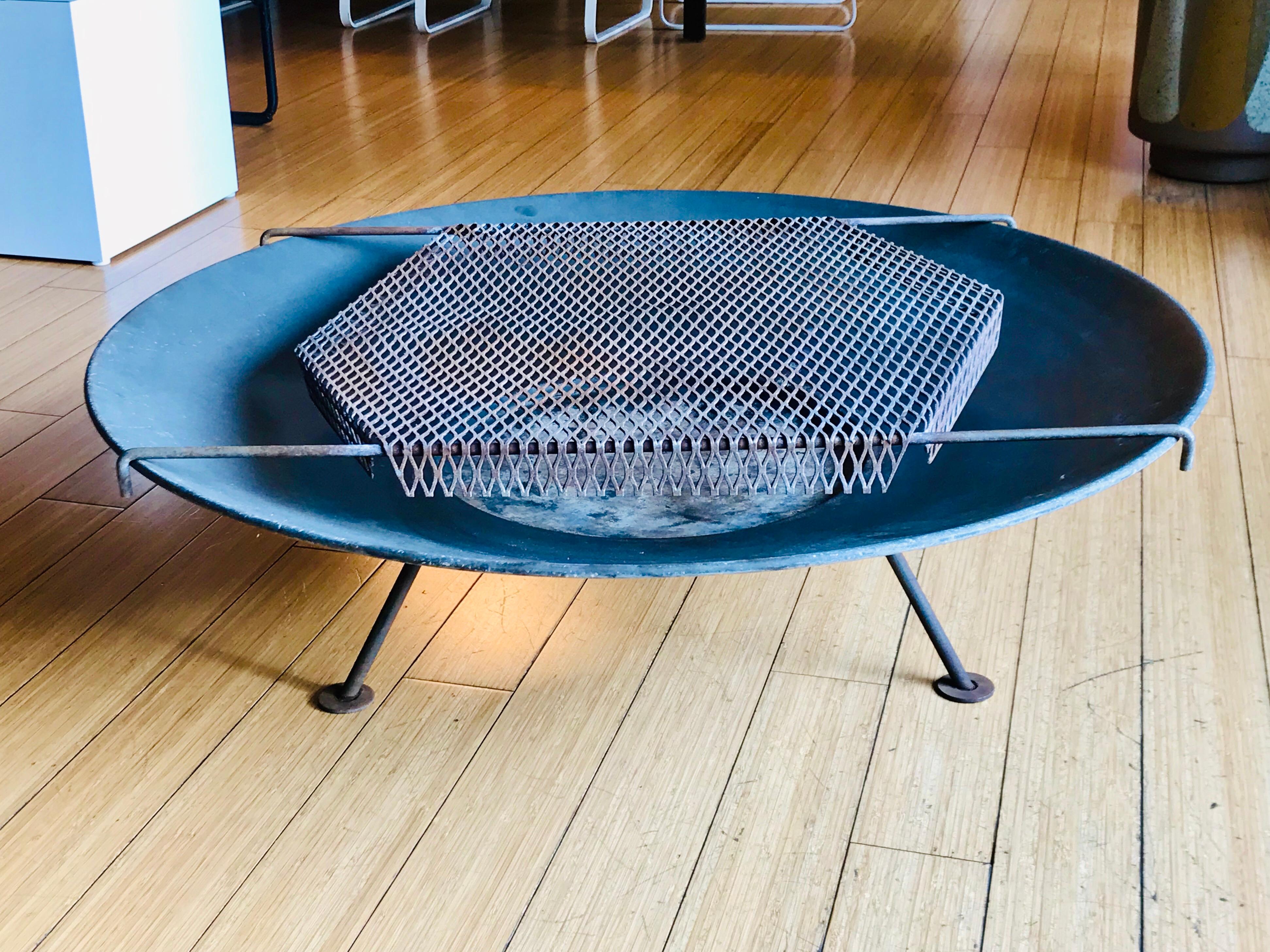 Rare design 
Form and function
Iron grill with large aluminum metal dish on tripod iron base
Original cleaned condition, no damage, normal wear / patina
Great addition for a Mid-Century Modern house paired next to Van keppel Green or Russel Woodard