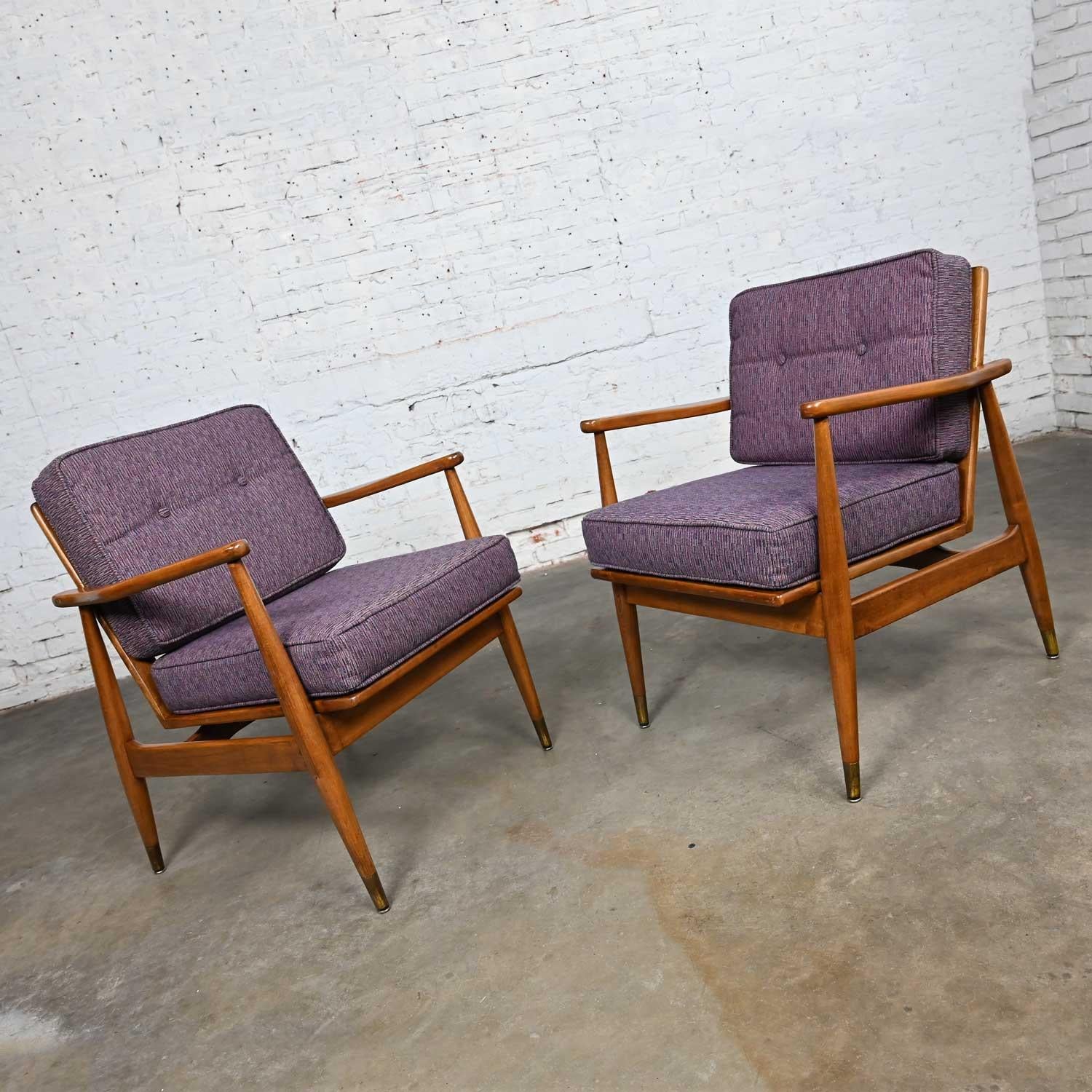 Lovely vintage MCM or Mid-Century Danish Modern armchairs or lounge chairs with tapered legs & brass sabots in the style of Folke Ohlsson for DUX. Beautiful condition, keeping in mind that these are vintage and not new so will have signs of use and