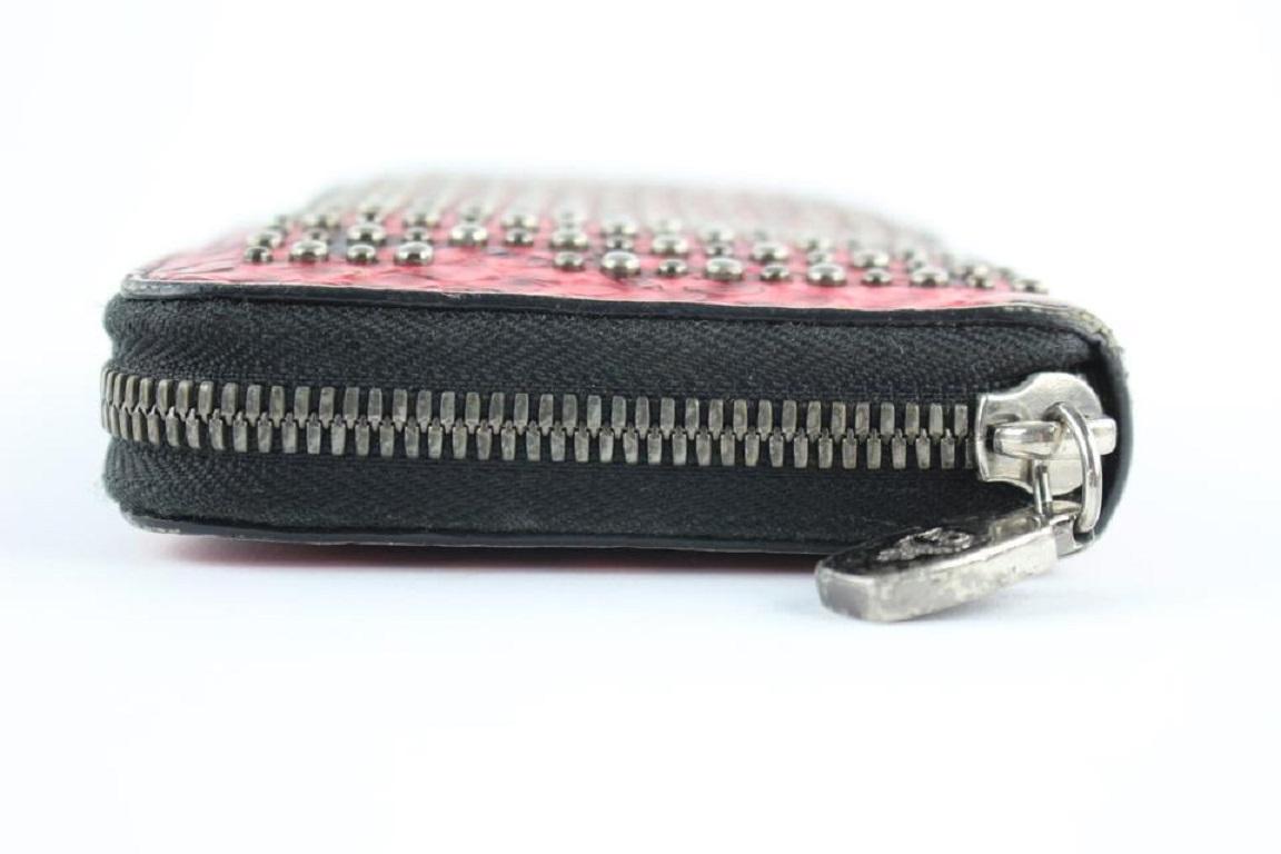 MCM Armour Visetos - Portefeuille en python clouté et imprimé monogramme avec fermeture éclair 231939 rose en vente 6
