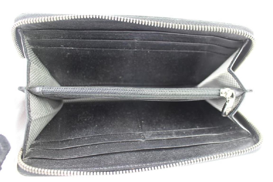 MCM Armour Visetos - Portefeuille en python clouté et imprimé monogramme avec fermeture éclair 231939 rose Bon état - En vente à Dix hills, NY