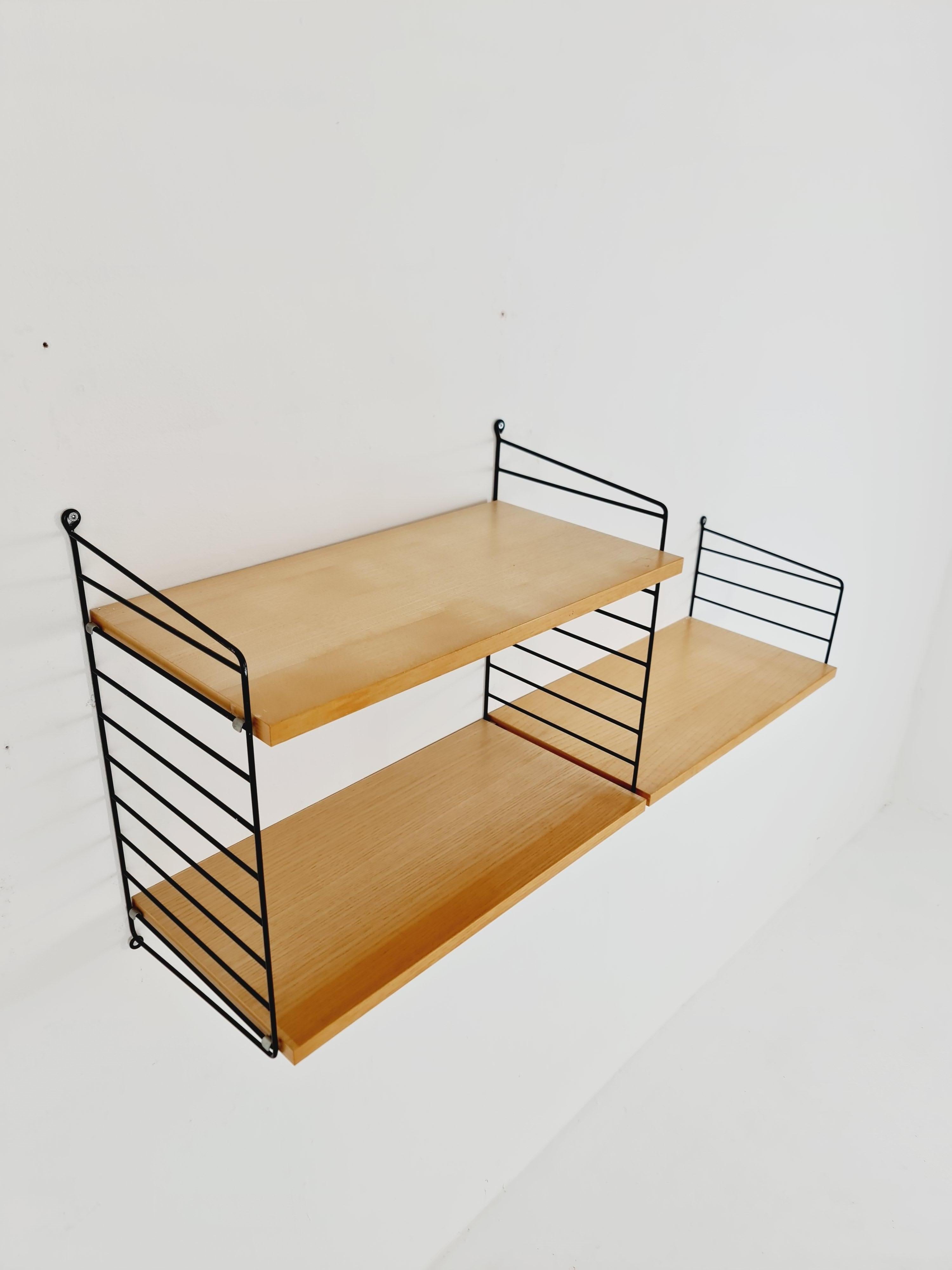 Mid-Century Modern MCM Ash shelving system - consists of Black lacquered metal ladders, from string For Sale