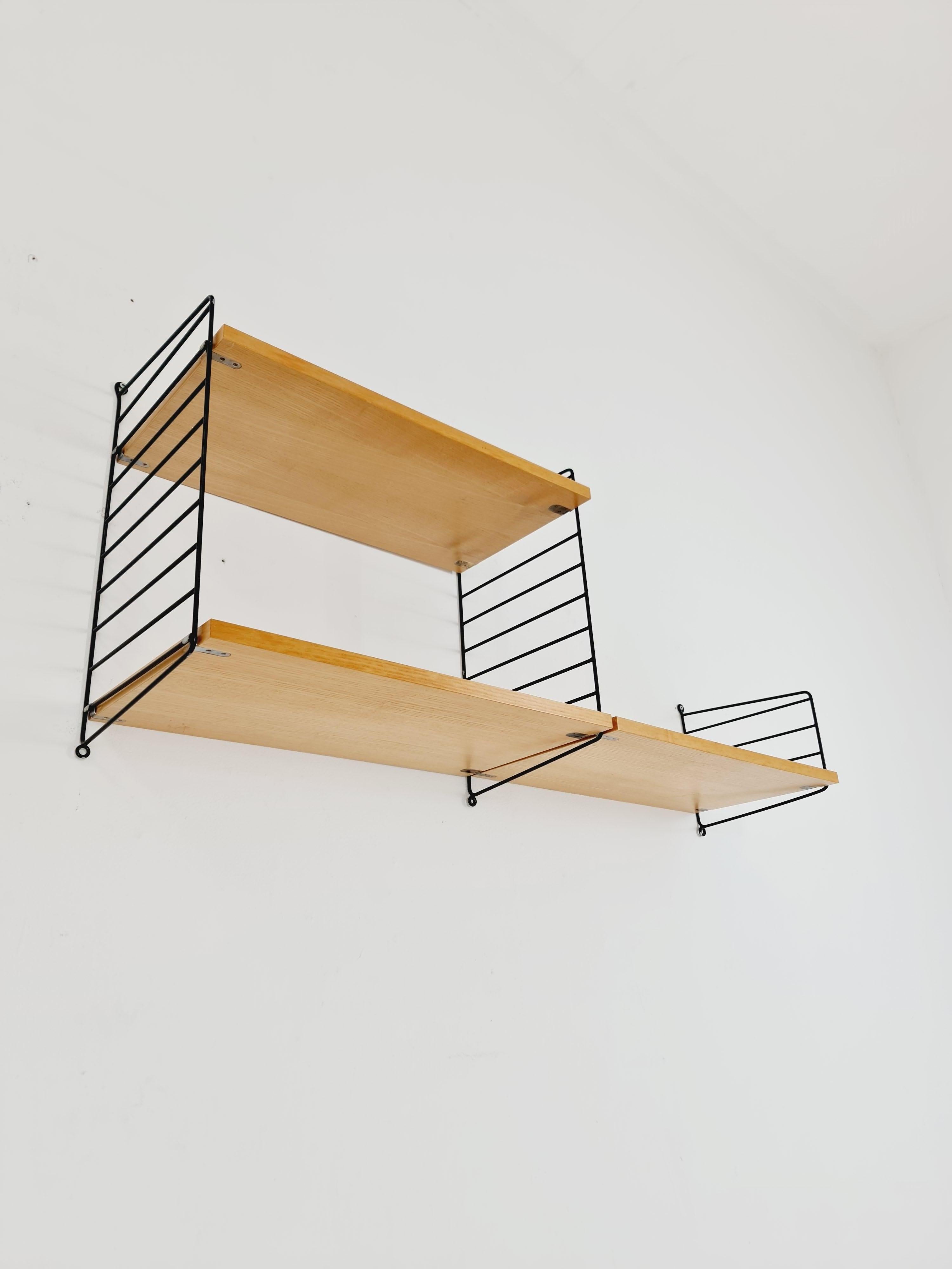 Mid-20th Century MCM Ash shelving system - consists of Black lacquered metal ladders, from string For Sale