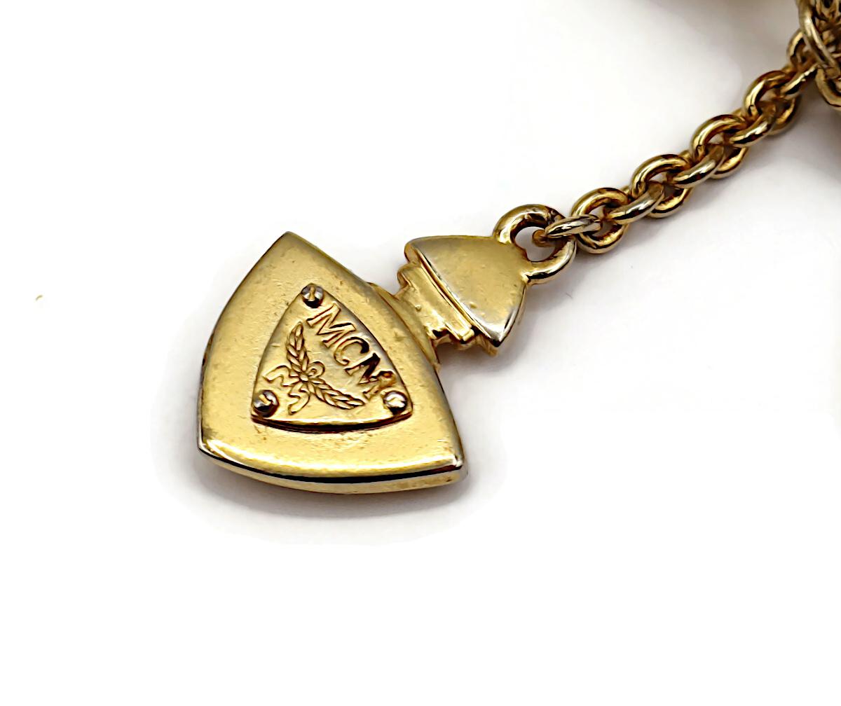 MCM (Atribuido a) Pendientes colgantes con dijes vintage en tono dorado en venta 14