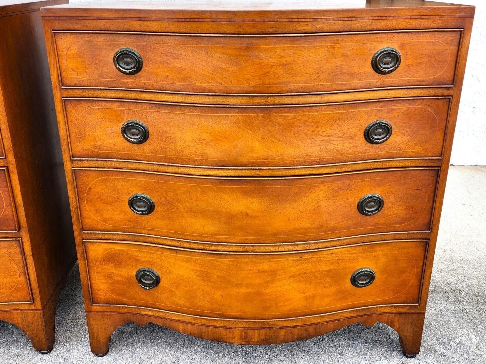 For FULL item description click on CONTINUE READING at the bottom of this page.

Offering One Of Our Recent Palm Beach Estate Fine Furniture Acquisitions Of A
Pair of MCM 1950s Serpentine Mahogany Bachelor Chests by OLD COLONY
With Satin Wood inlay