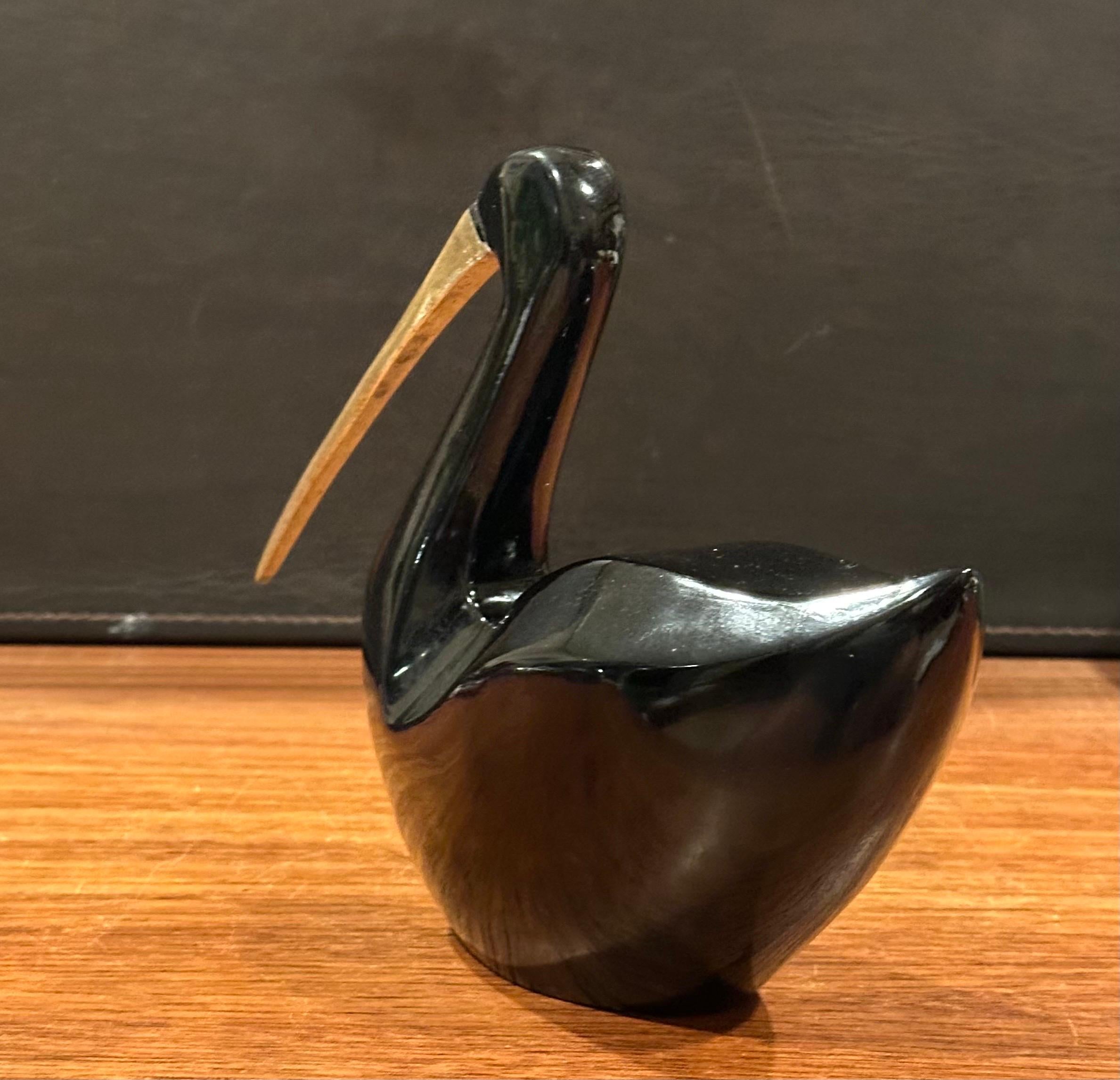 MCM Bakelite Black Bird with Brass Beak by Rosenthal Netter For Sale 1