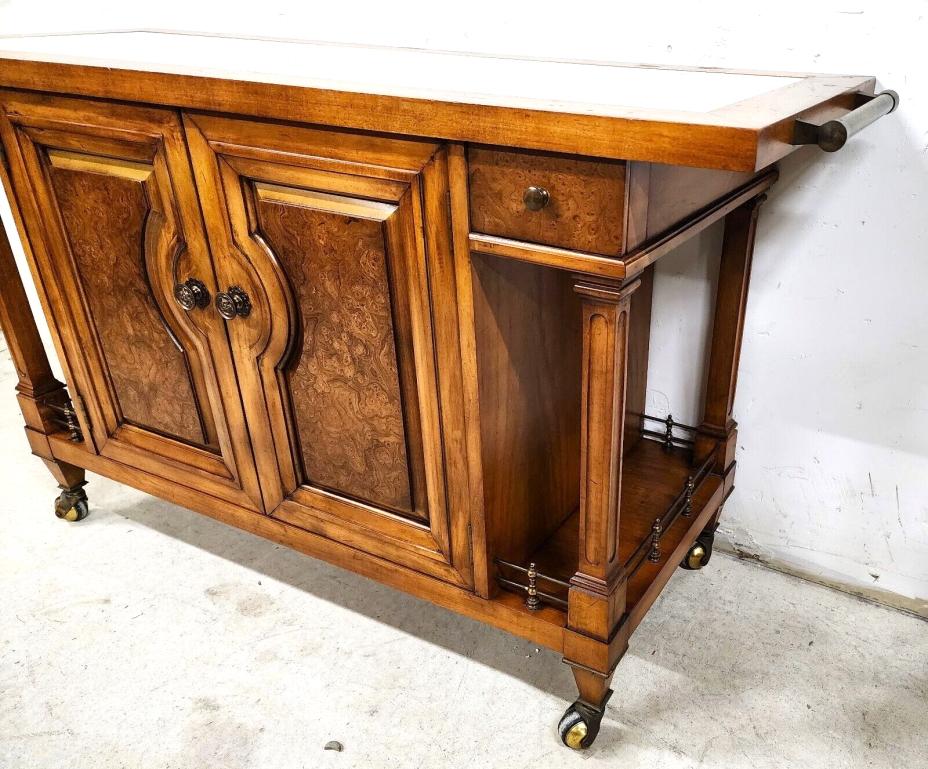 For FULL item description click on CONTINUE READING at the bottom of this page.

Offering One Of Our Recent Palm Beach Estate Fine Furniture Acquisitions Of A
Mid-Century Modern Bar Rolling Cart From The Contempora Line by J L METZ
Featuring a
