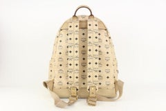 Sac à dos MCM beige à monogrammes Visetos Logo avec étoile cloutée taille moyenne 921 cm73