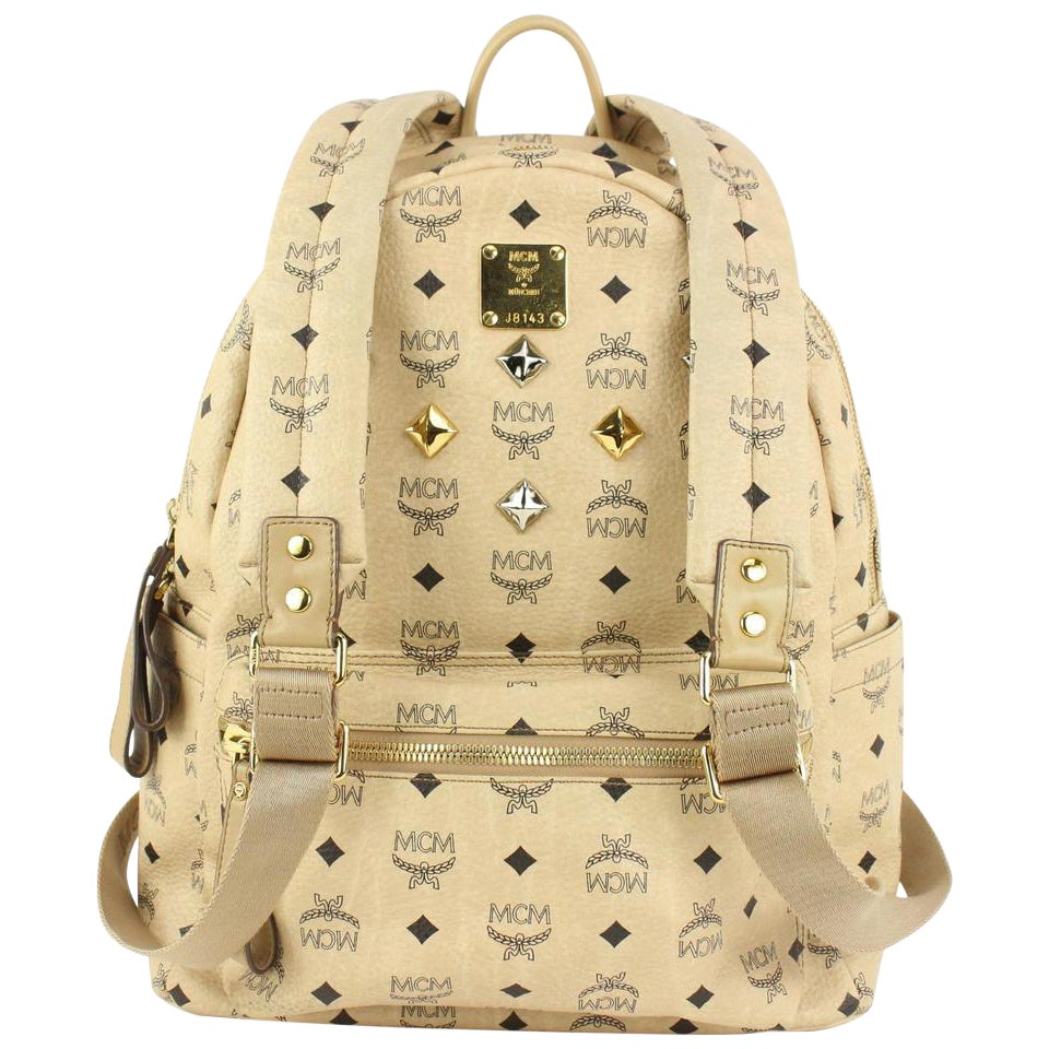 MCM Beige Monograma Visetos Logo Mochila Stark Mediana Tachonada 921mcm73