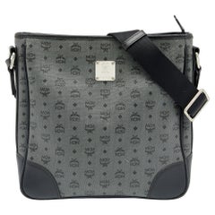 MCM Crossbody-Tasche aus beschichtetem Segeltuch und Leder in Schwarz/Grau