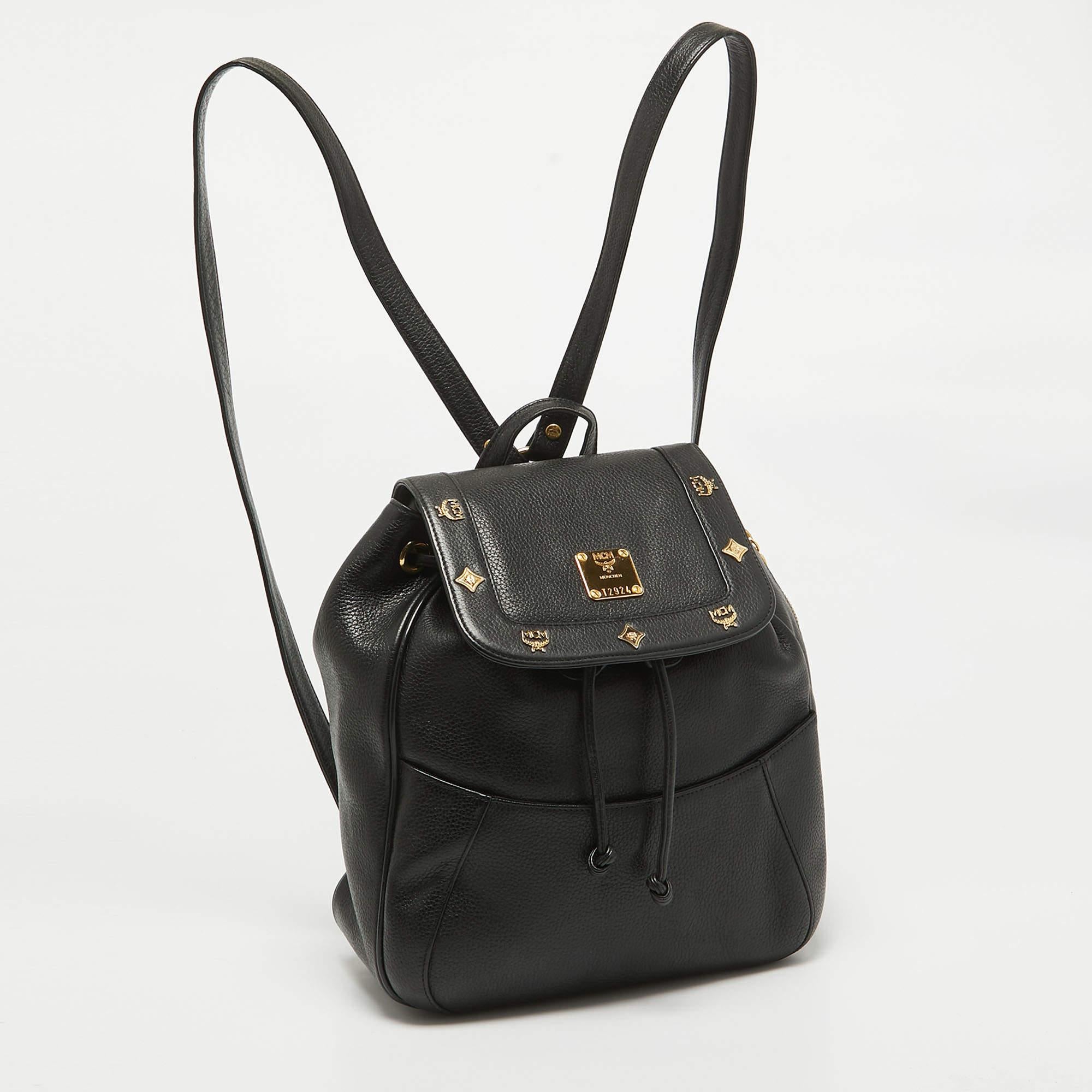 MCM Black Leather Studded Flap Backpack In Good Condition For Sale In Dubai, Al Qouz 2