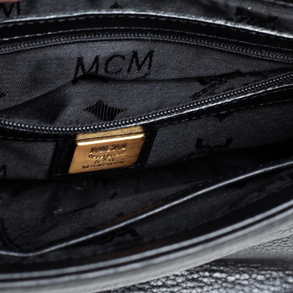 MCM Black Leather Studded Flap Shoulder Bag In Good Condition In Dubai, Al Qouz 2