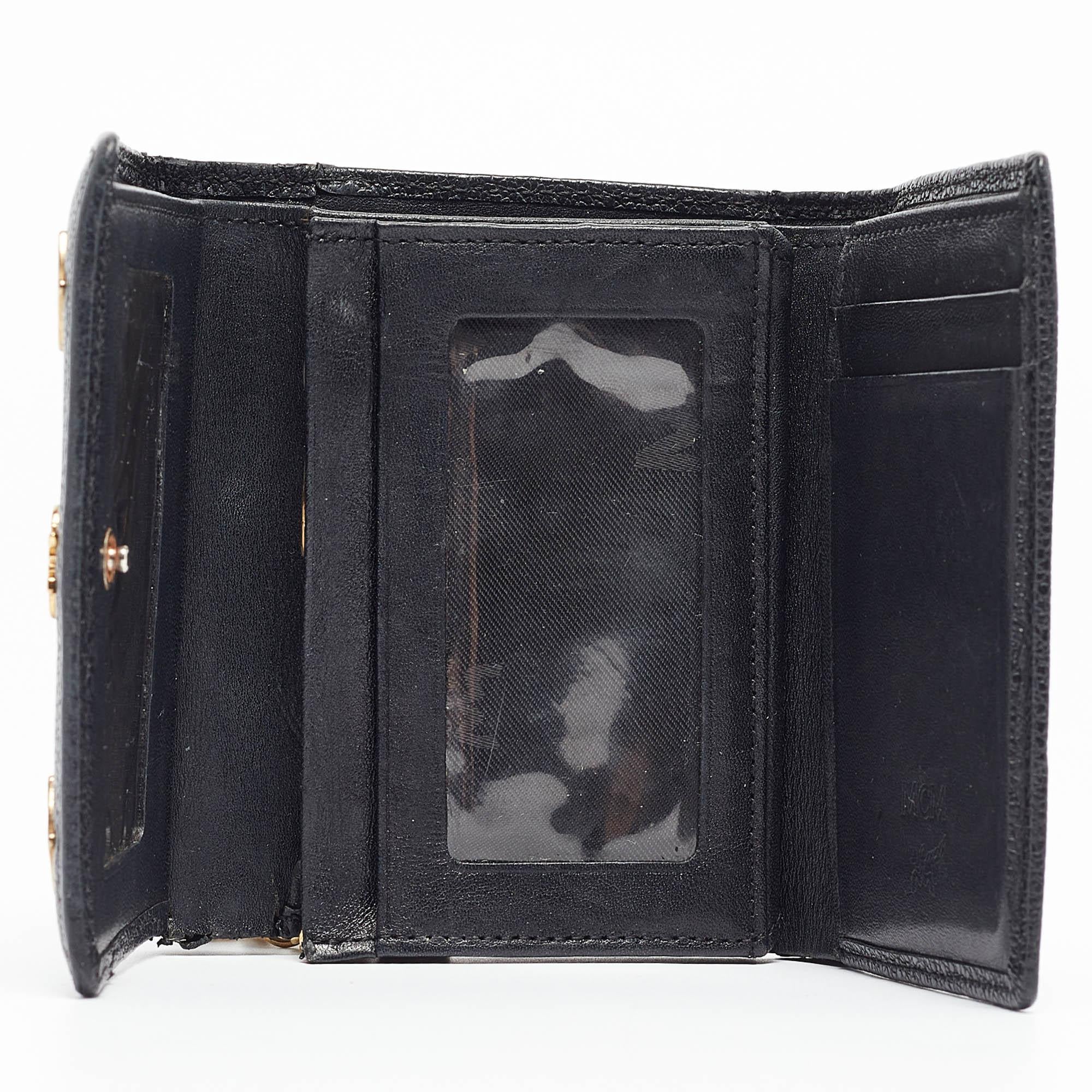 This small but functional wallet from MCM has been expertly designed in a trifold silhouette that can neatly organize all your essentials. It features card slots, a zipper pouch to hold coins, and slots to keep your currency. It can easily be