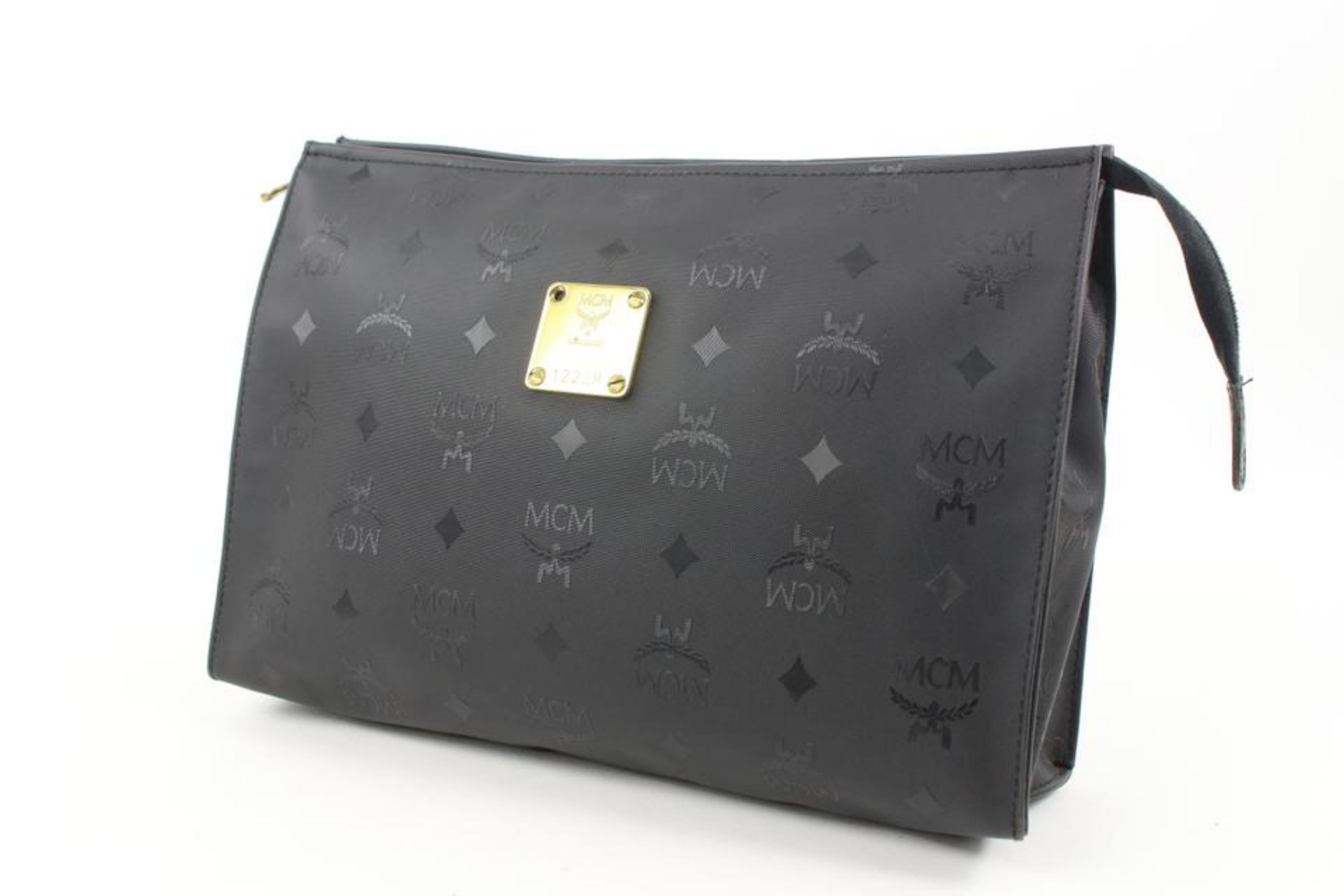 MCM Black Monogram Visetos Logo Toiletry Pouch Make Up Case Clutch 118m35
Date Code/Serial Number: 1222M
Made In: Germany
Measurements: Length:  11