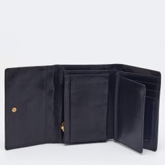 MCM Black Quilted Leather Embellished Flap Compact Wallet