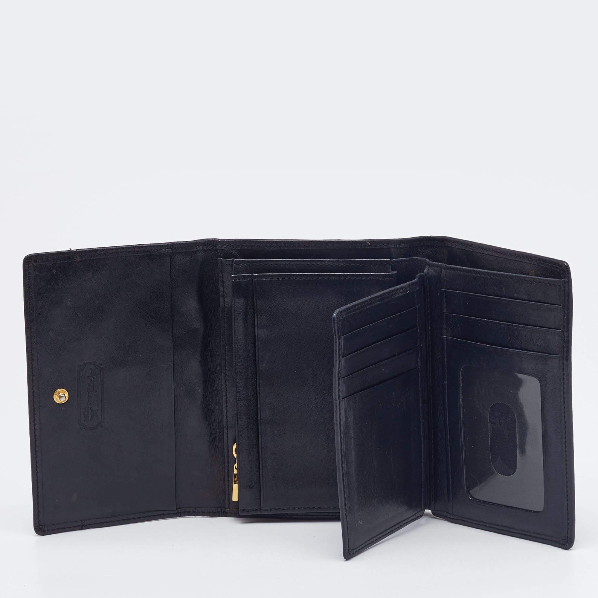 MCM Black Quilted Leather Embellished Flap Compact Wallet In Fair Condition For Sale In Dubai, Al Qouz 2