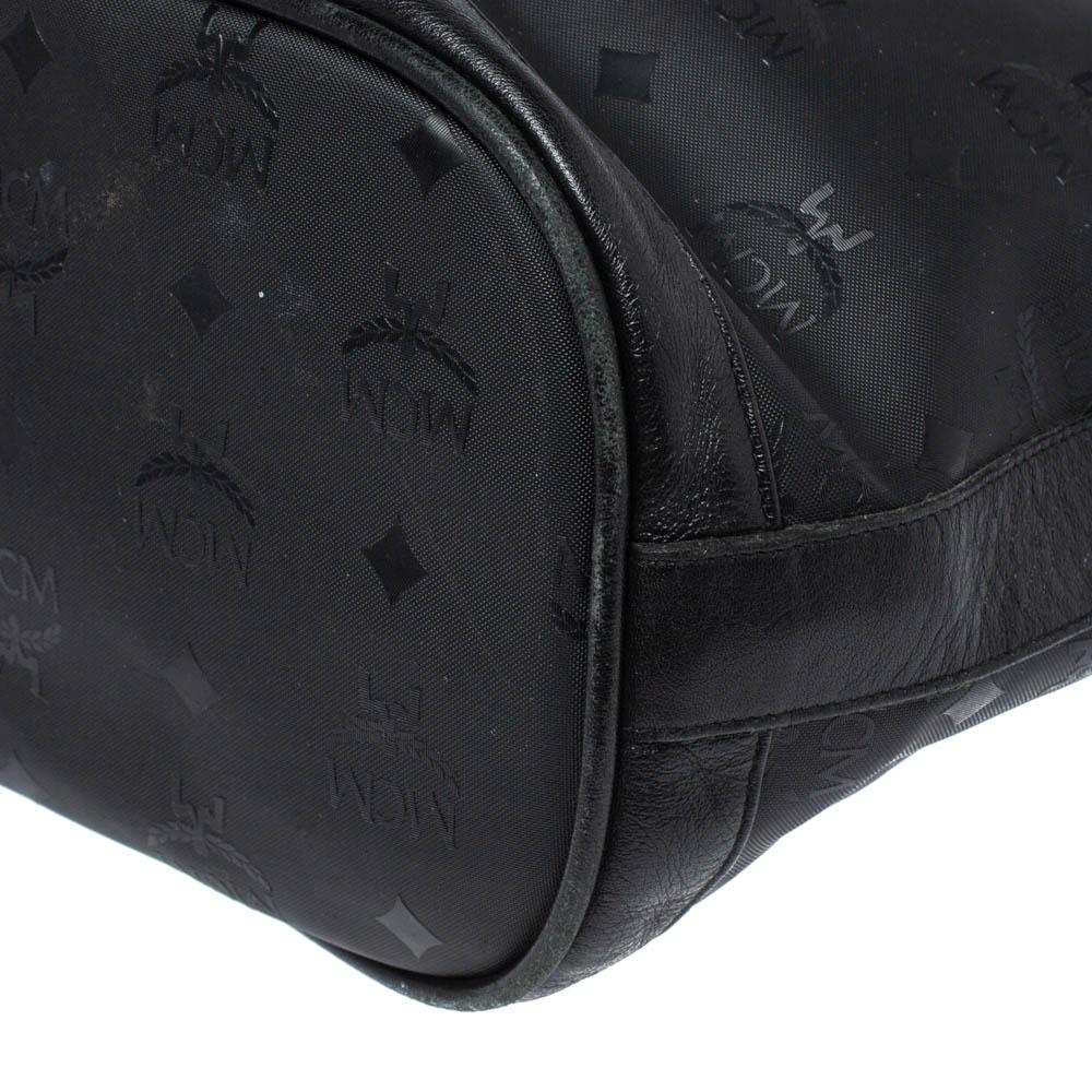MCM Black Signature Nylon and Leather Drawstring Flap Bucket Bag In Fair Condition In Dubai, Al Qouz 2