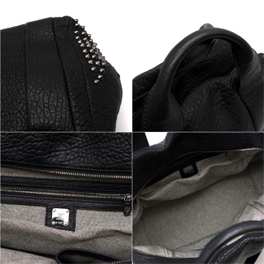 MCM Black Textured Leather Studded Top Handle Bag   1