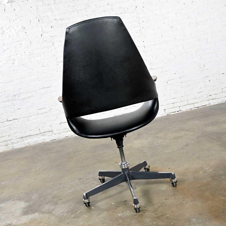 MCM Black Vinyl Rolling Desk Chair Wood Arms by Arthur Umanoff for