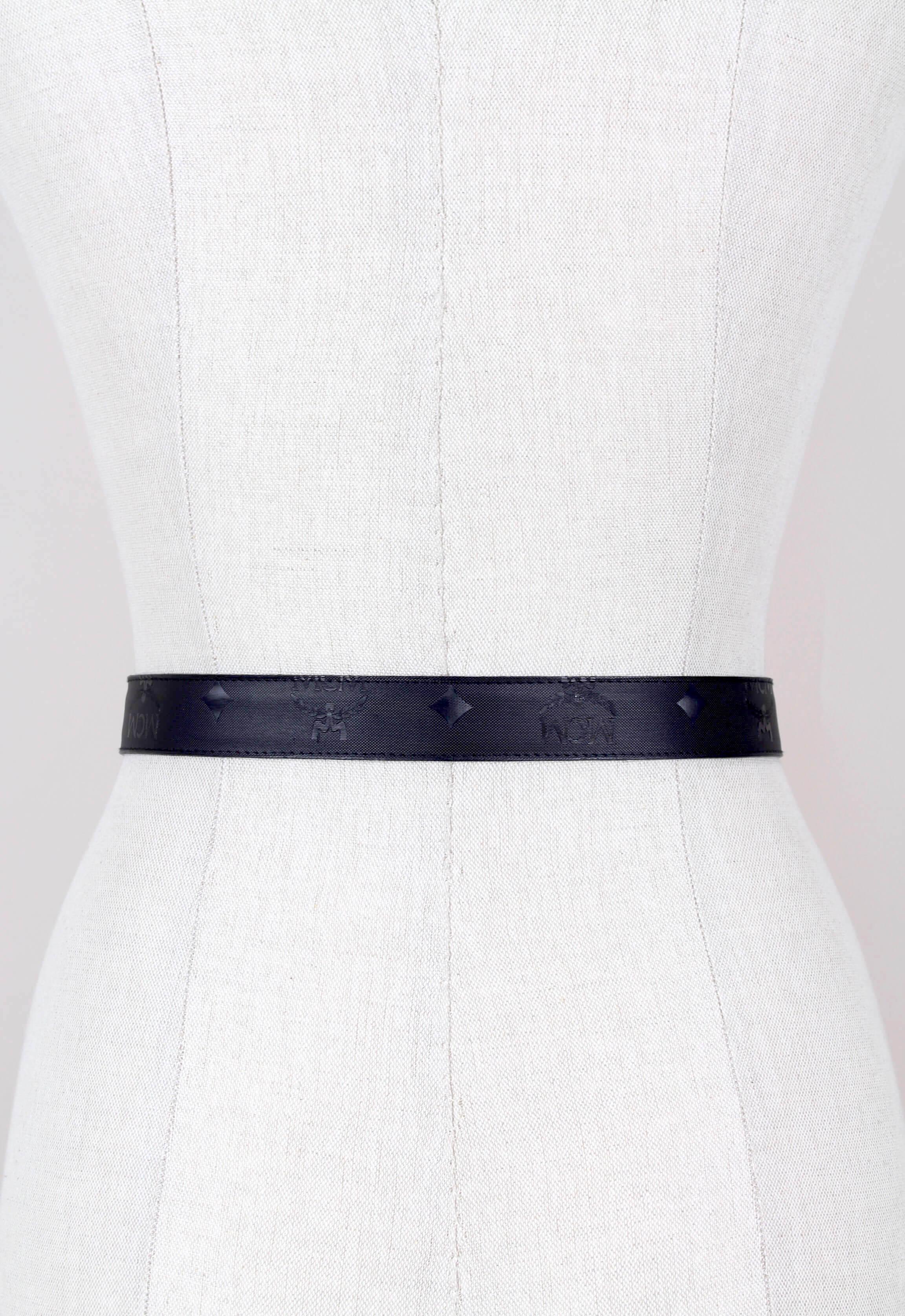This 1980s MCM waist belt dates from that period when the company still belonged to its founder Michael Cromer. The black design is crafted from the brand’s signature logo-printed material, called Visetos – a coated canvas. It is set off with the
