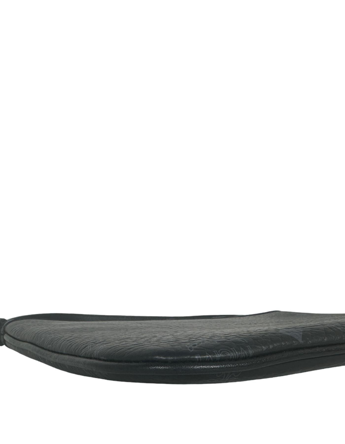 MCM - Pochette noire Visetos avec monogramme en vente 1