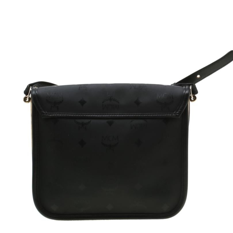 Crafted from nylon and leather this MCM creation features the signature Visetos design. This crossbody bag is lined with suede and provides a decent space to house your essentials with a small zip pocket and front flap-lock closure. Detailed with