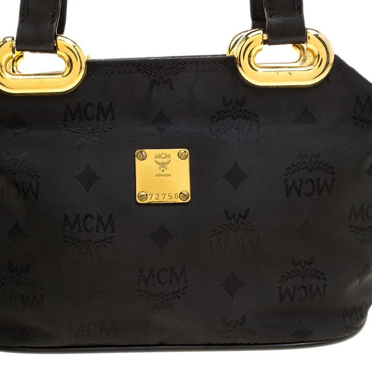mcm black and white purse