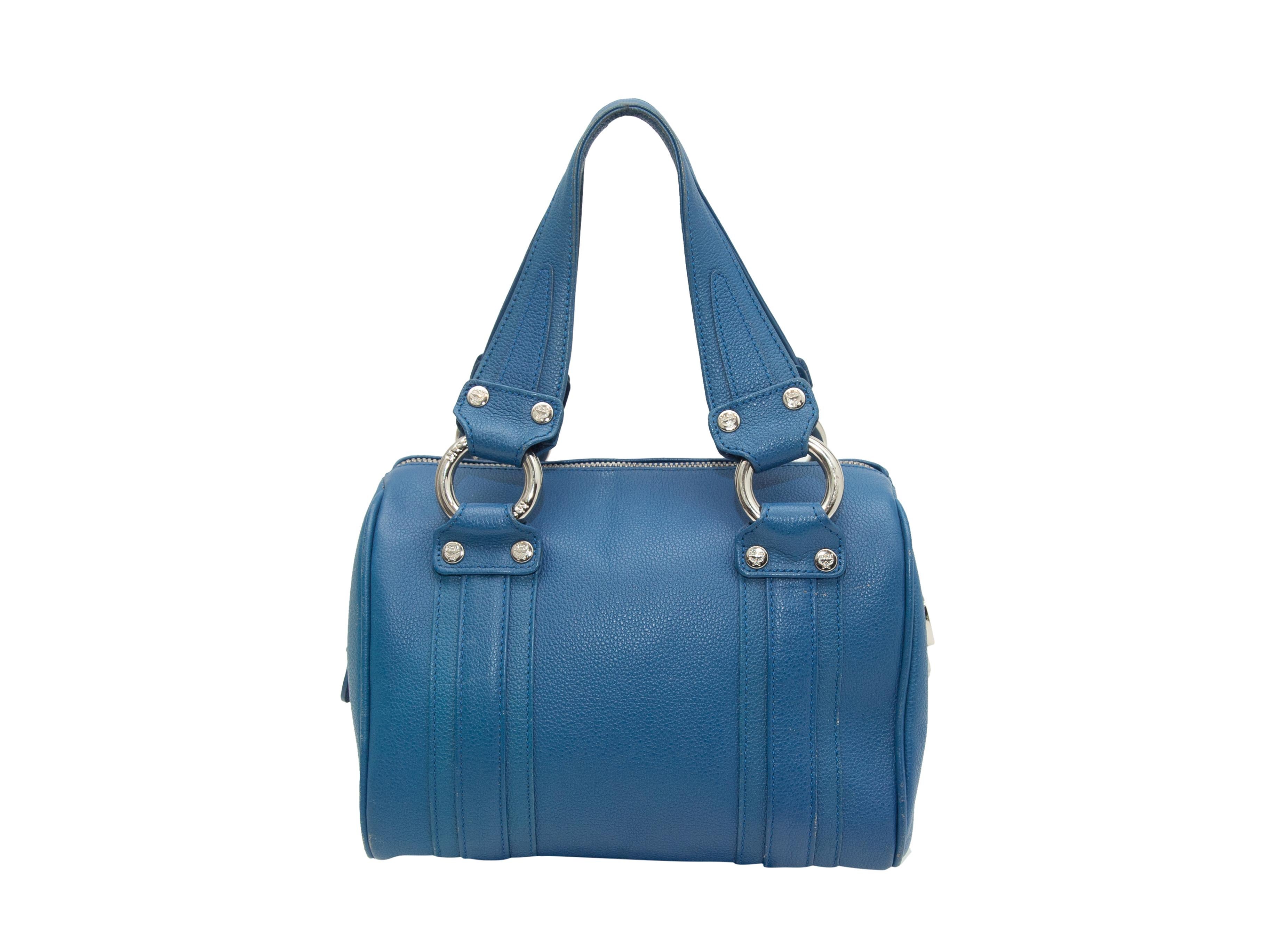 Product details: Blue leather small Boston handbag by MCM. Silver-tone hardware. Dual top handles. Zip closure at top. 8