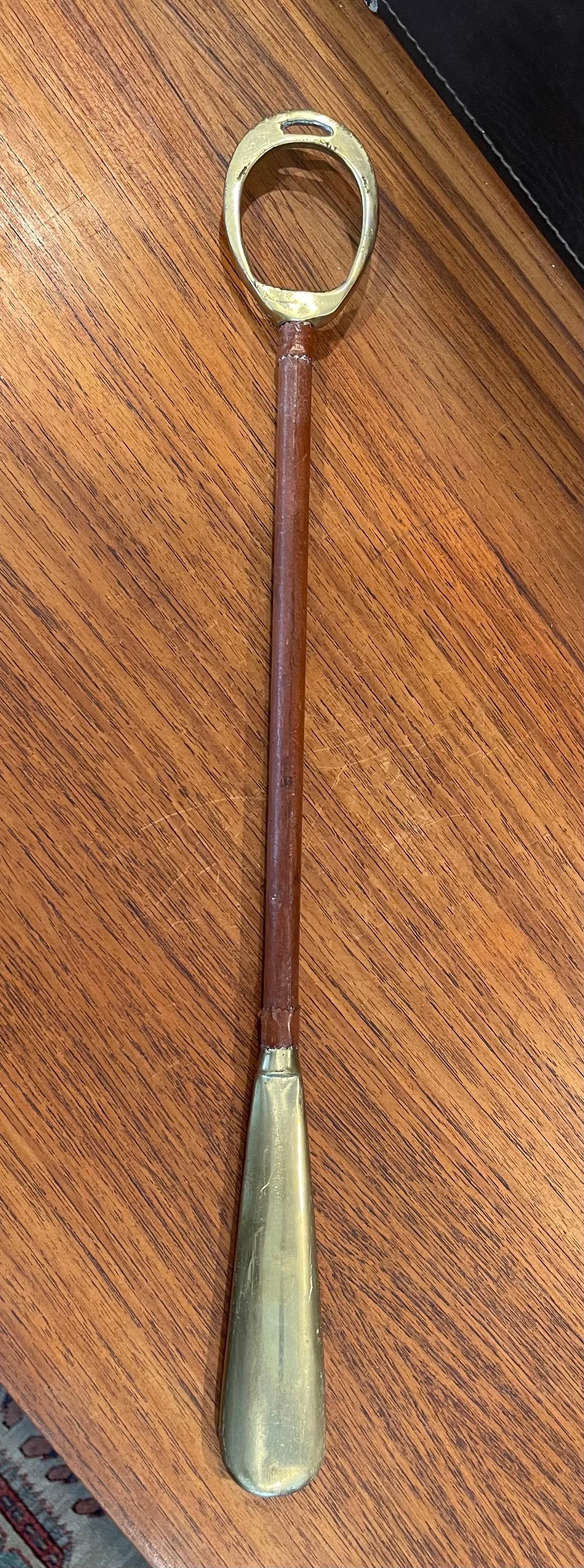 French MCM Brass / Leather Long Shoehorn in the Style of Jacques Adnet by Arfango For Sale