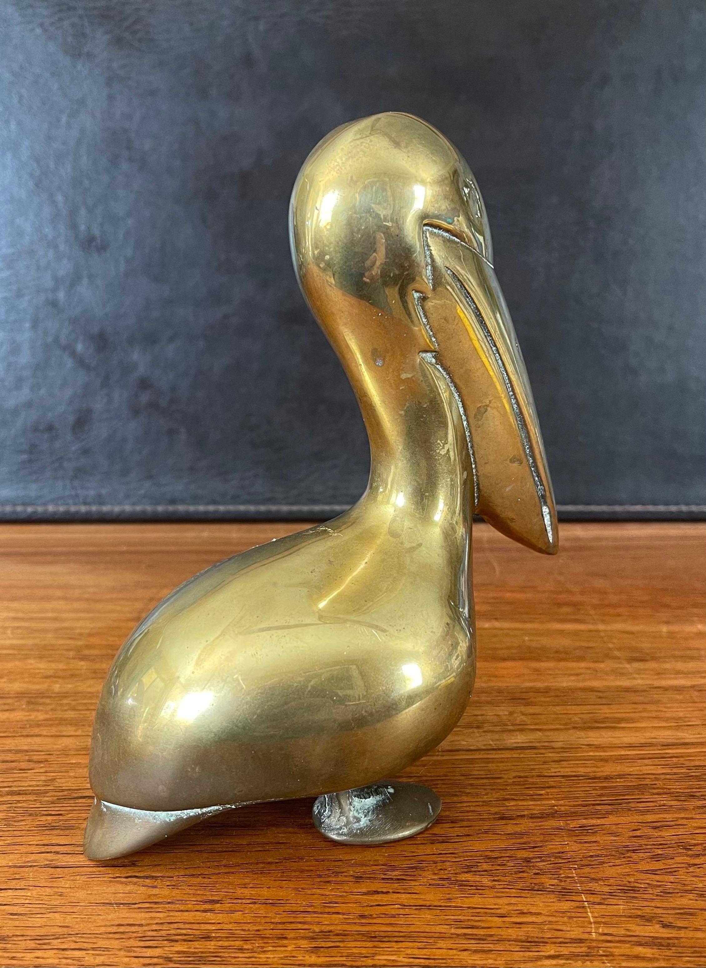 vintage brass pelican