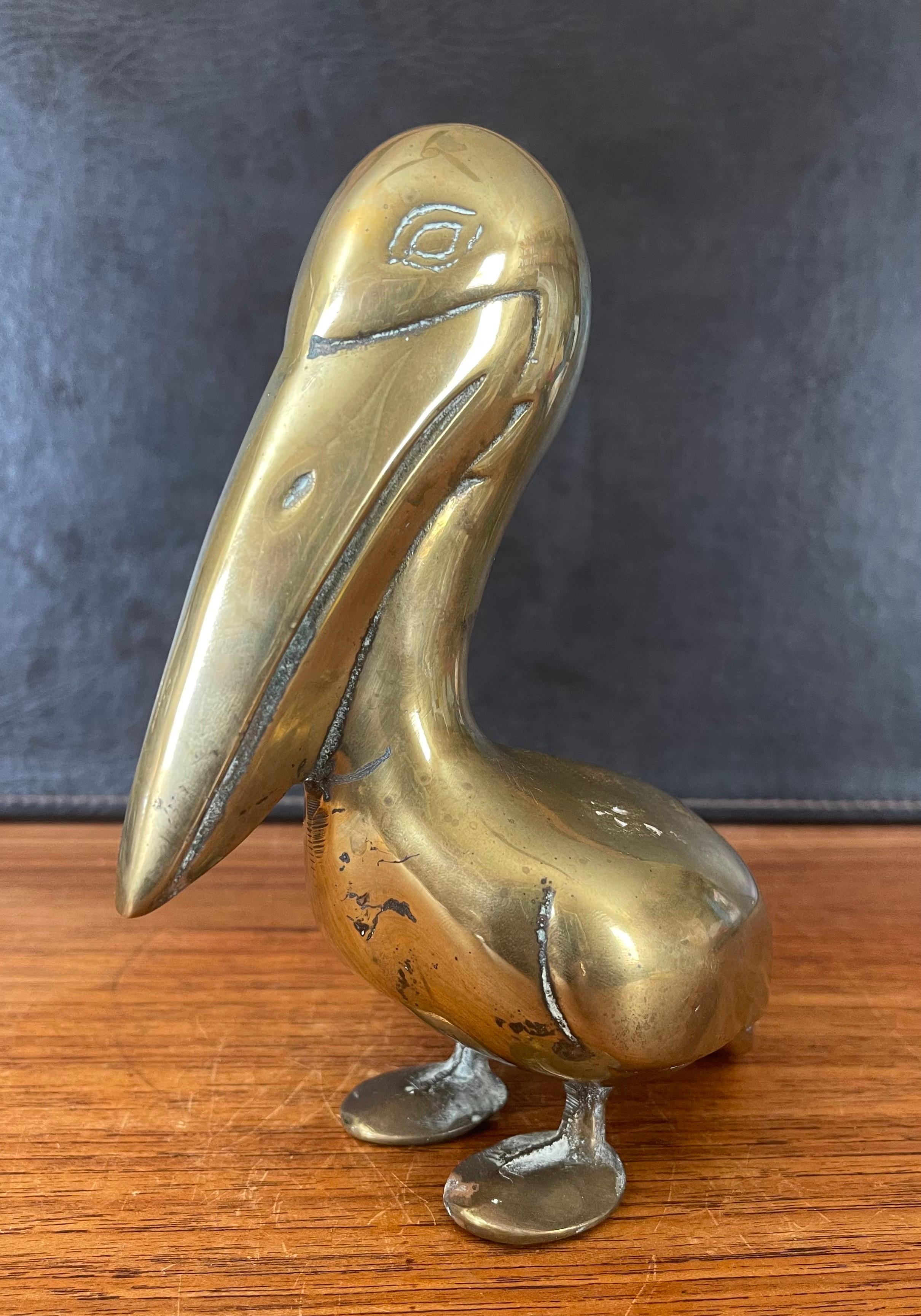 brass pelican figurine