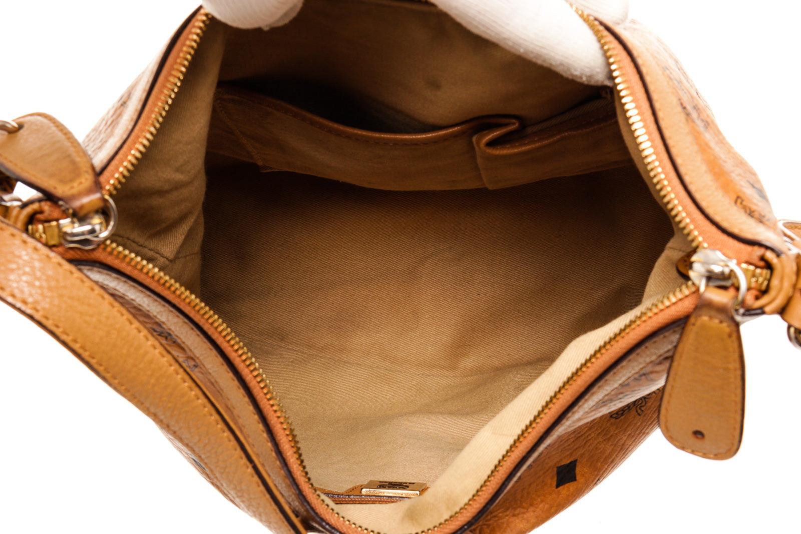 MCM Hobo-Tasche aus braunem Segeltuchleder mit Segeltuch-Leder und goldfarbenen Beschlägen Damen