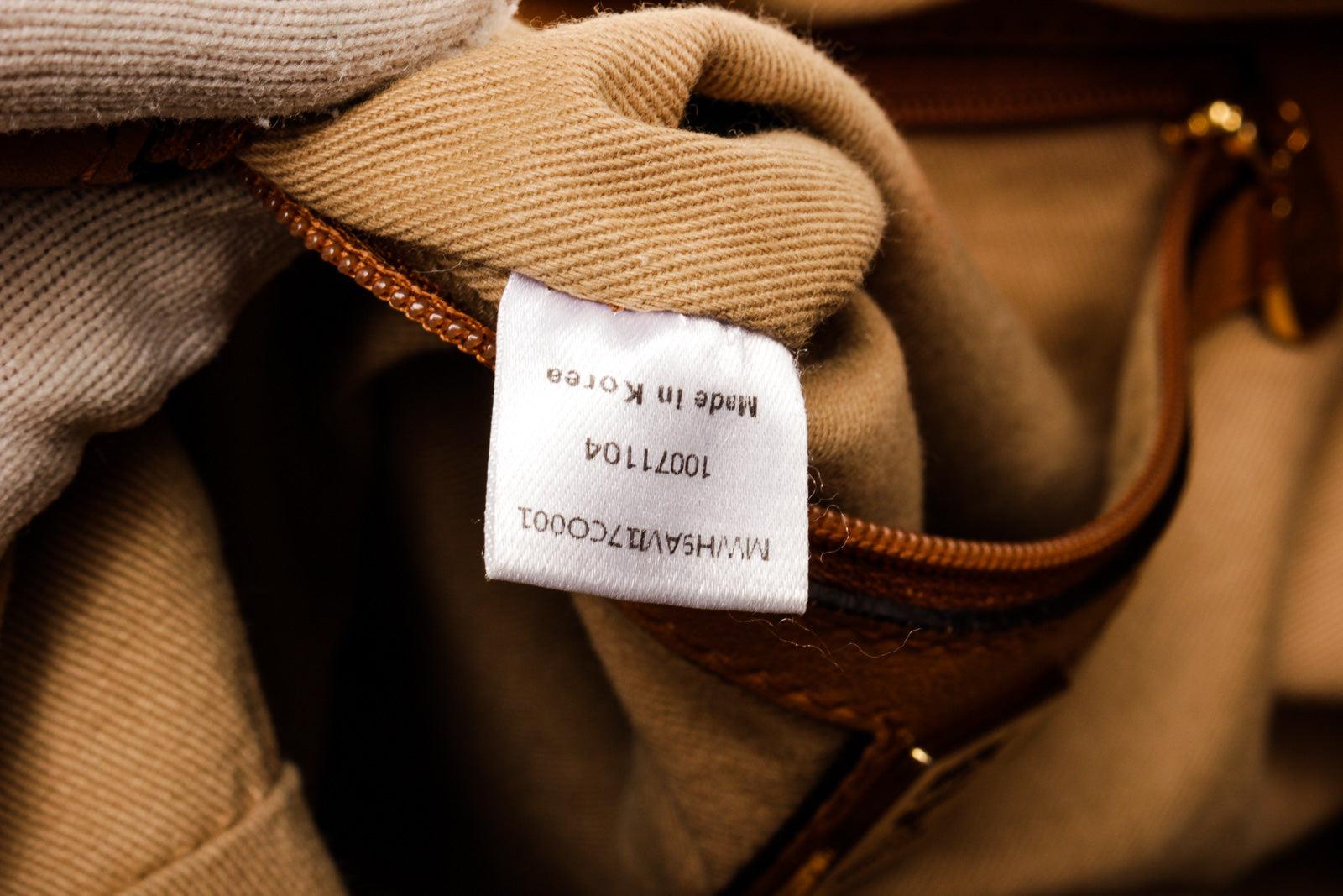 MCM Hobo-Tasche aus braunem Segeltuchleder mit Segeltuch-Leder und goldfarbenen Beschlägen 2