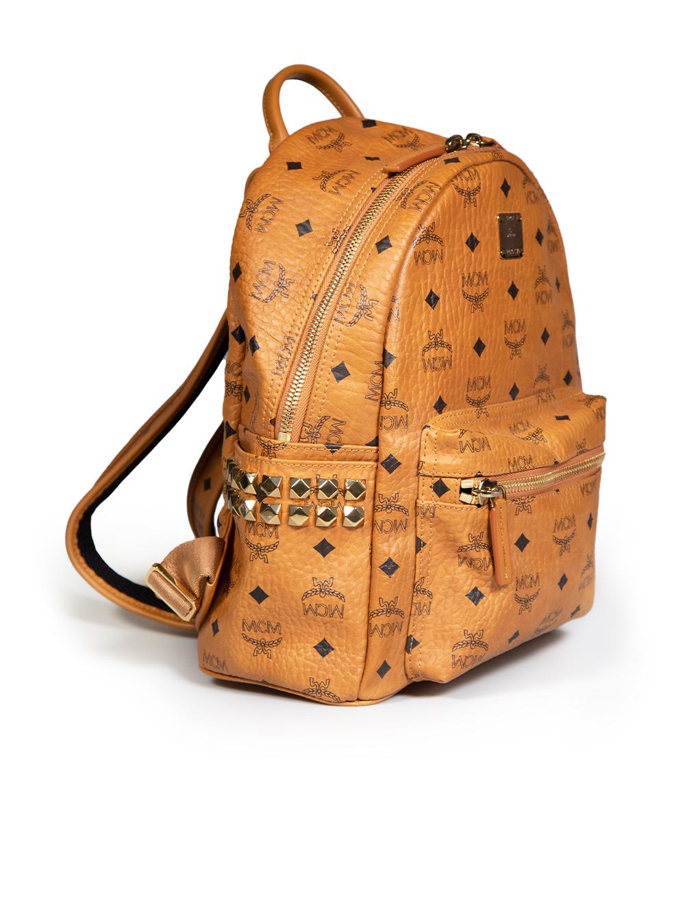 CONDITION is Very good. Minimal wear to bag is evident. Minimal scratches to the hardware on this used MCM designer resale item.
 
 
 
 Details
 
 
 Model: Stark
 
 Brown
 
 Leather
 
 Medium backpack
 
 Gold tone hardware
 
 side studded detail
 
