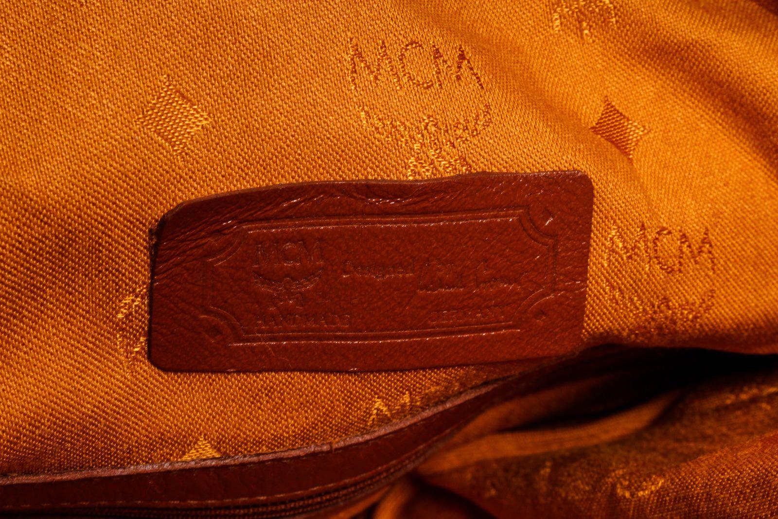 MCM Brown Visetos Leather Drawstring Bucket Bag In Good Condition In Irvine, CA