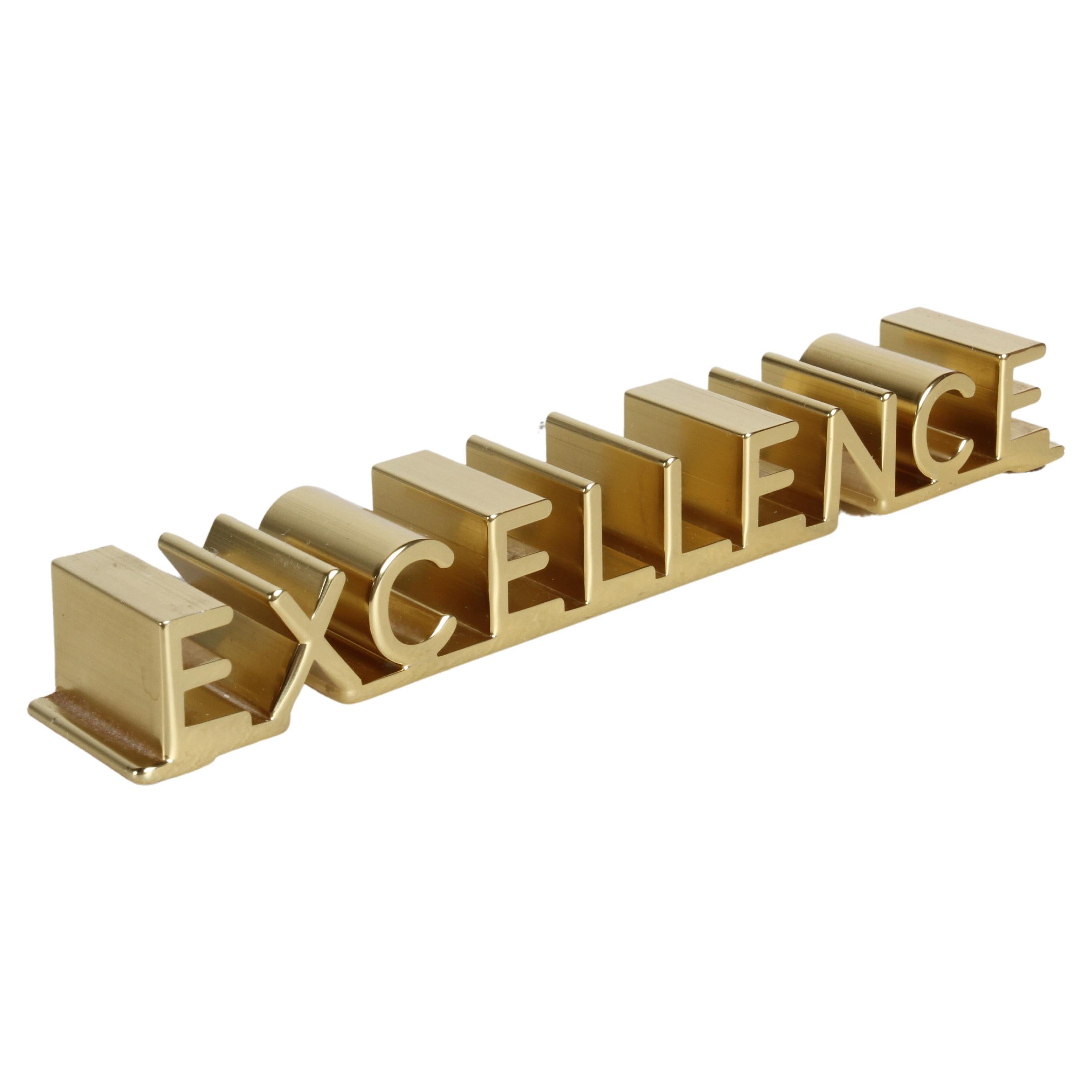 MCM Bruce Fox Gold Anodized Aluminum 3D "Excellence" Motivation Desk Accessory  For Sale