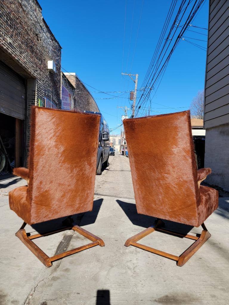 MCM Cantilever Rockers Newly Upholstered in a Brazilian Cowhide, Pair  In Good Condition In Chicago, IL