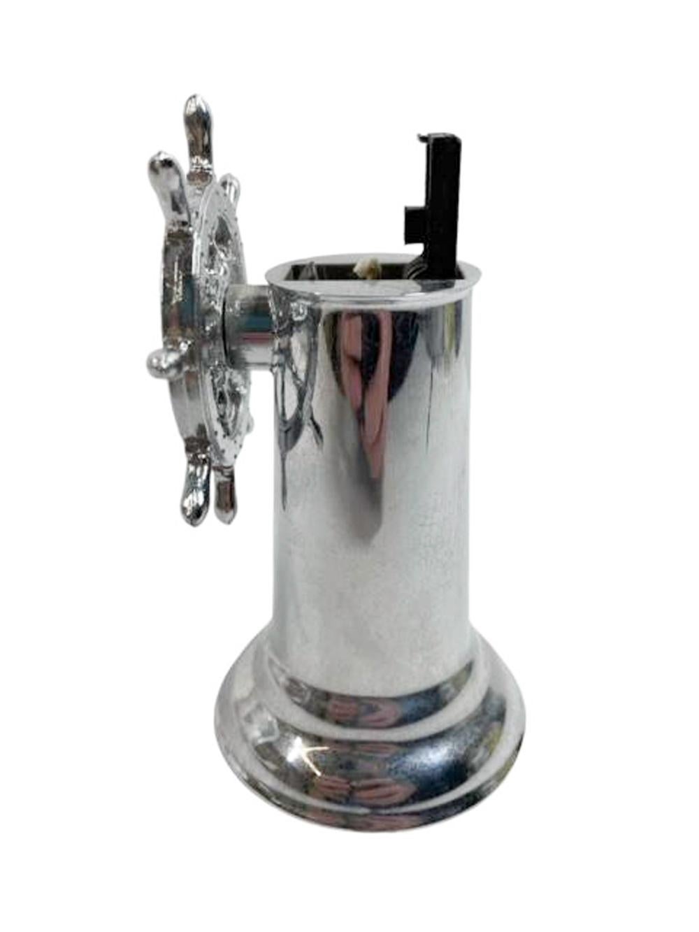 Mid twentieth century chromed metal table lighter in the form of a ship's helm, appears to have never been used. Turn the wheel to operate.