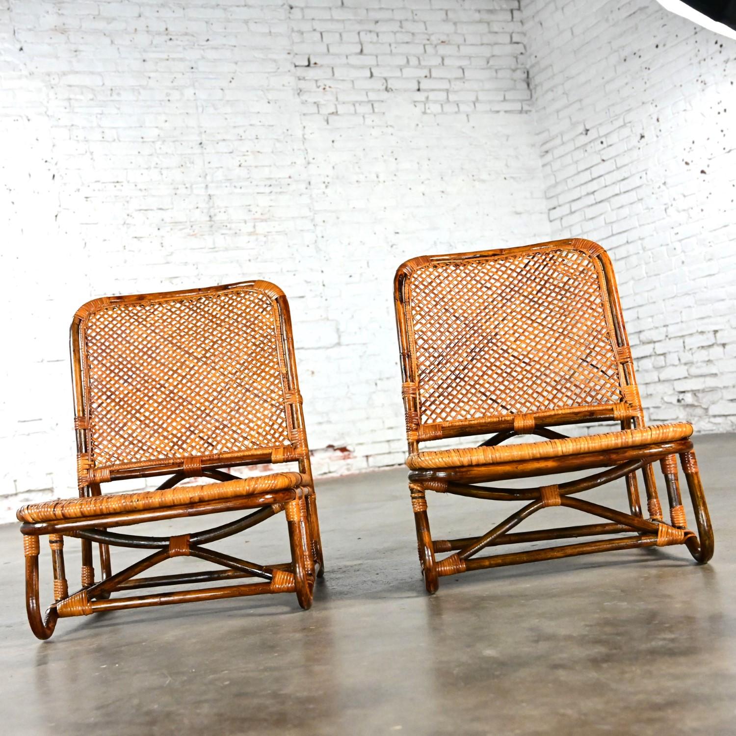 Incredible Mid-20th Century Coastal Island Rattan & wicker Low, Legless, or Japanese “Zaisu” lounge chairs in the style of Calif Asia, a pair.  Beautiful condition, keeping in mind that these are vintage and not new so will have signs of use and