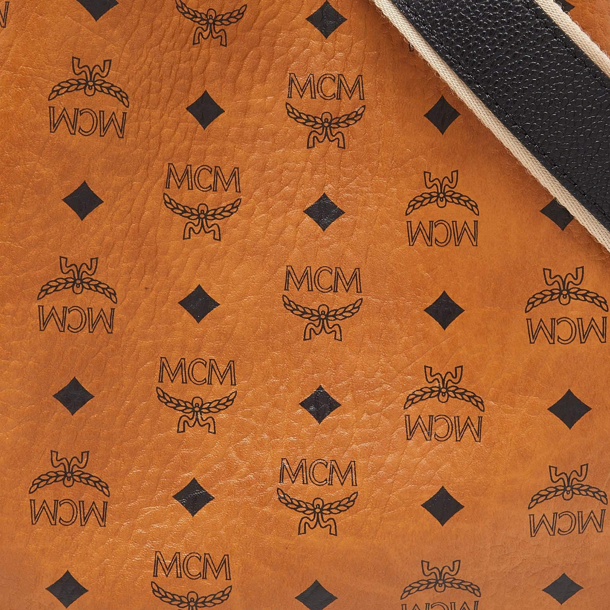Elevate your everyday elegance with this MCM women's tote. Meticulously crafted, it seamlessly blends luxury and functionality to be a reliable accessory.

